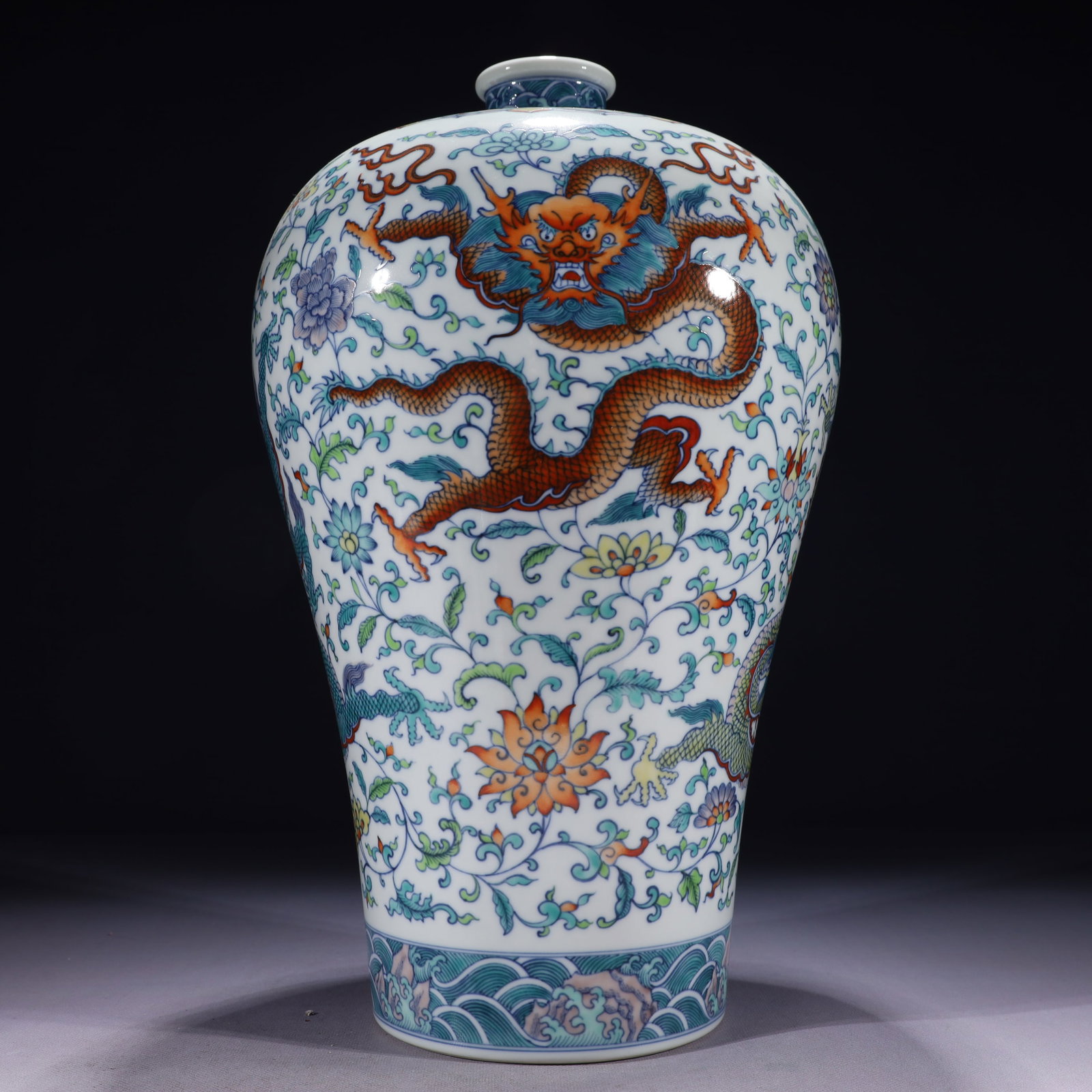 An Exquisite Blue and White Doucai Lotus and Dragon Pattern Vase: An Exquisite Blue and White Doucai Lotus and Dragon Pattern Vase,Qing Dynasty,China,Yongzheng Six-character Mark,Size:8.3inx15.4in,Weight:4750g