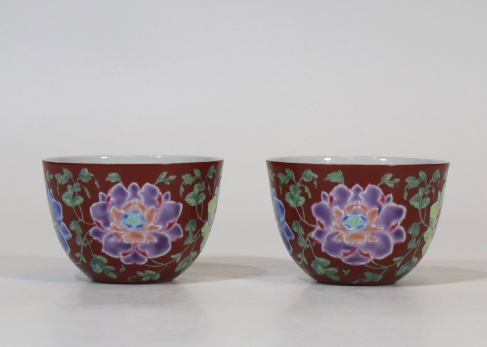 A Pair of Exquisite Coral Red Glazed Famille-Rose Flower Pattern Cups: A Pair of Exquisite Coral Red Glazed Famille-Rose Flower Pattern Cups,Qing Dynasty,China,Kangxi Four-character Mark,Size:2.8inx1.9in