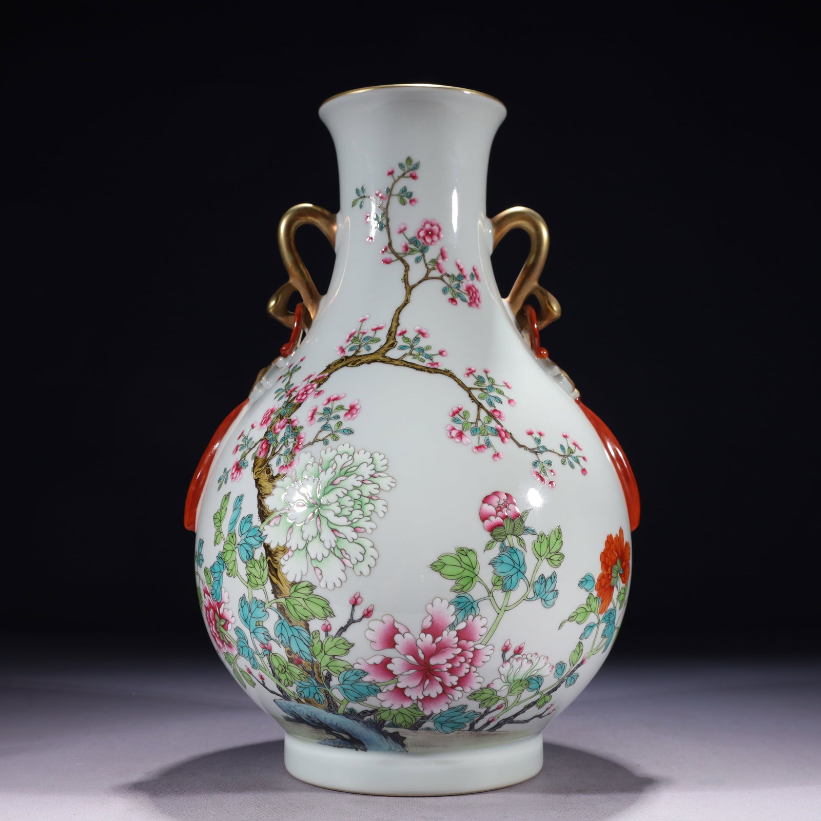 An Exquisite Famille-Rose Painted Gold Flower Pattern Double-Ears Vase: An Exquisite Famille-Rose Painted Gold Flower Pattern Double-Ears Vase,Qing Dynasty,China,Qianlong Six-character Mark,Size:7.9inx12.6in,Weight:2200g 粉彩描金花卉