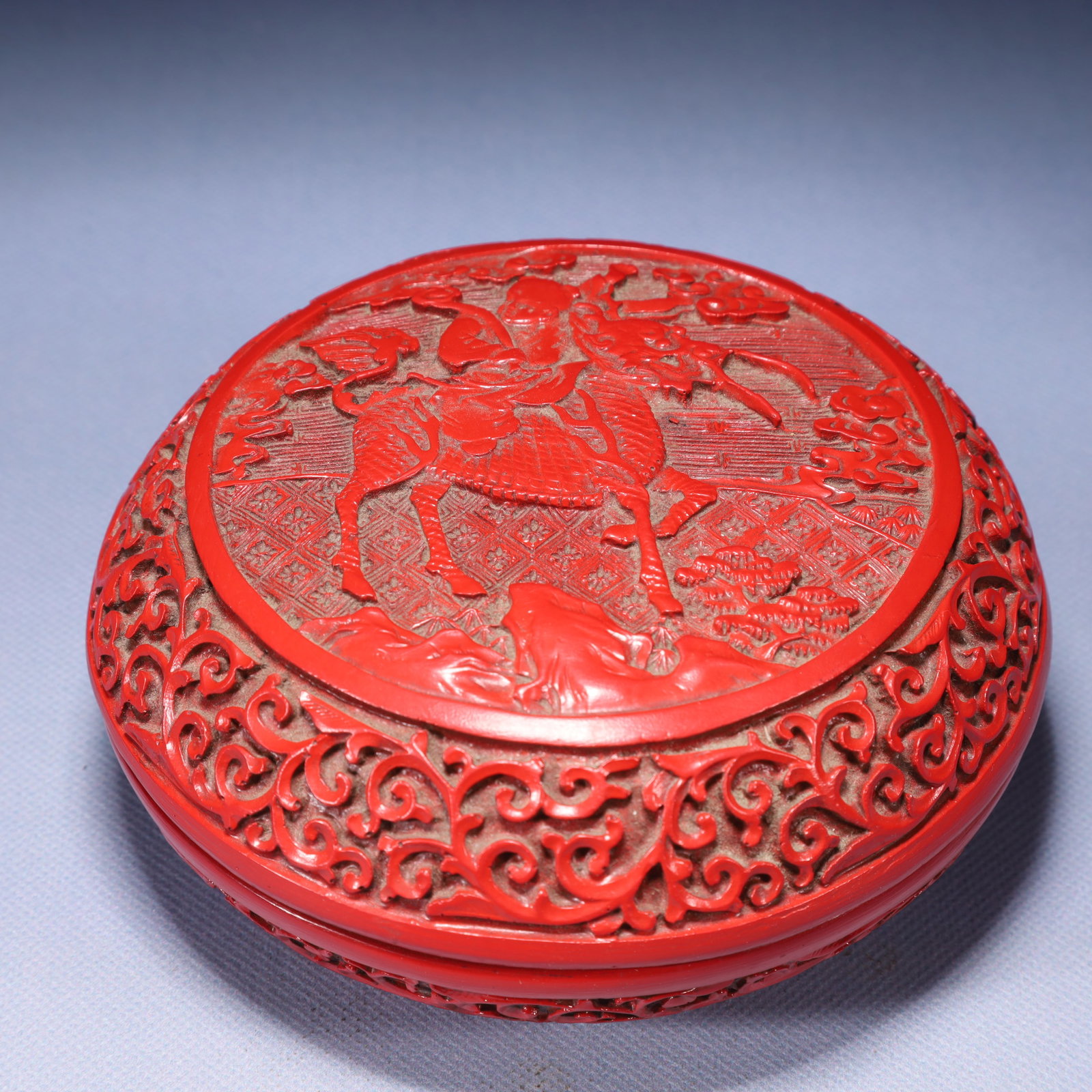 An Exquisite Carved Red Lacquer Kylin Pattern Box with Cover: An Exquisite Carved Red Lacquer Kylin Pattern Box with Cover,Qing Dynasty,China,Qianlong Four-character Mark,Size:5.5inx2.8in,Weight:450g 剔红漆麒麟纹盖௡