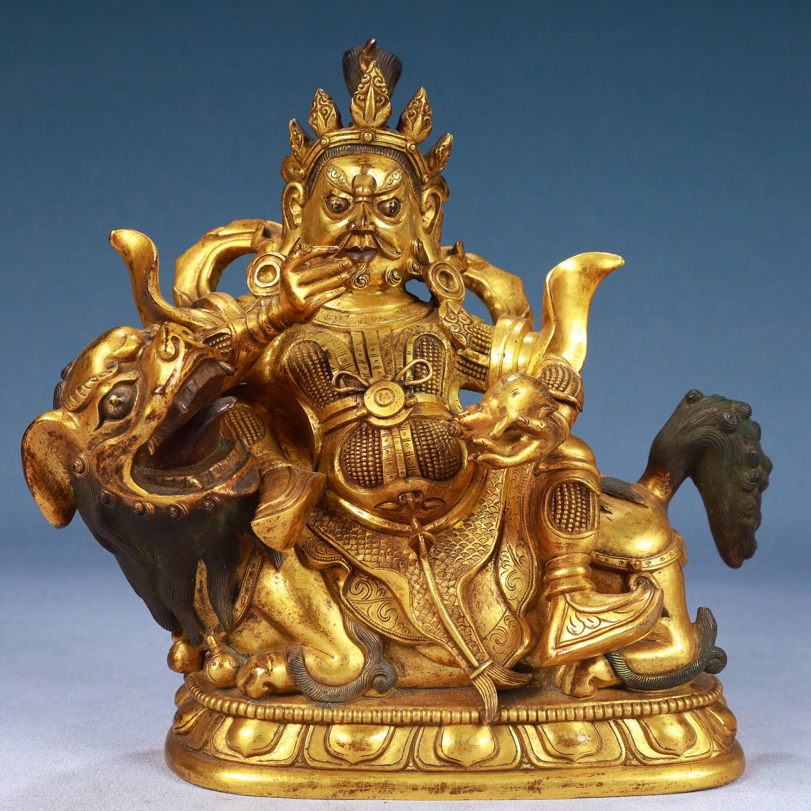 A Solemn Gilt Bronze Statue of Mammon Rides the Lion: A Solemn Gilt Bronze Statue of Mammon Rides the Lion,Qing Dynasty, China,Size:7.9inx3.9inx8.3in,Weight:4250g 铜鎏金骑狮财神像,中国清&#