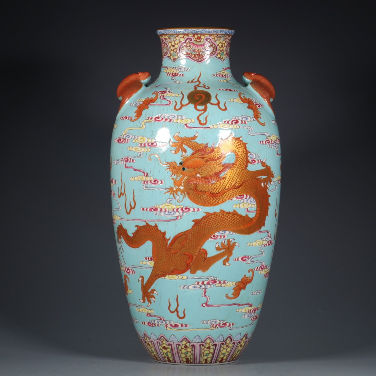 A Rare Turquoise Glazed Famille-Rose Painted Gold Auspicious Cloud and Dragon Pattern Beast-Ears: A Rare Turquoise Glazed Famille-Rose Painted Gold Auspicious Cloud and Dragon Pattern Beast-Ears Vase,Qing Dynasty,China,Qianlong Six-character Mark,Size:13.3inx3.1in 松石绿釉&