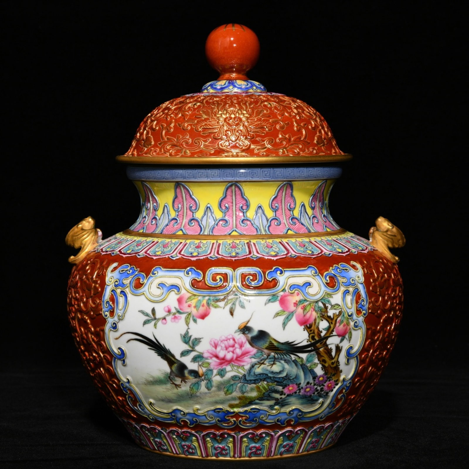 An Exquisite Red Glazed Famille-Rose Painted Gold Flower and Bird Pattern Jar with Cover: An Exquisite Red Glazed Famille-Rose Painted Gold Flower and Bird Pattern Jar with Cover,Qing Dynasty,China,Qianlong Six-character Mark,Size:9.4inx7.7in 红釉粉彩描金