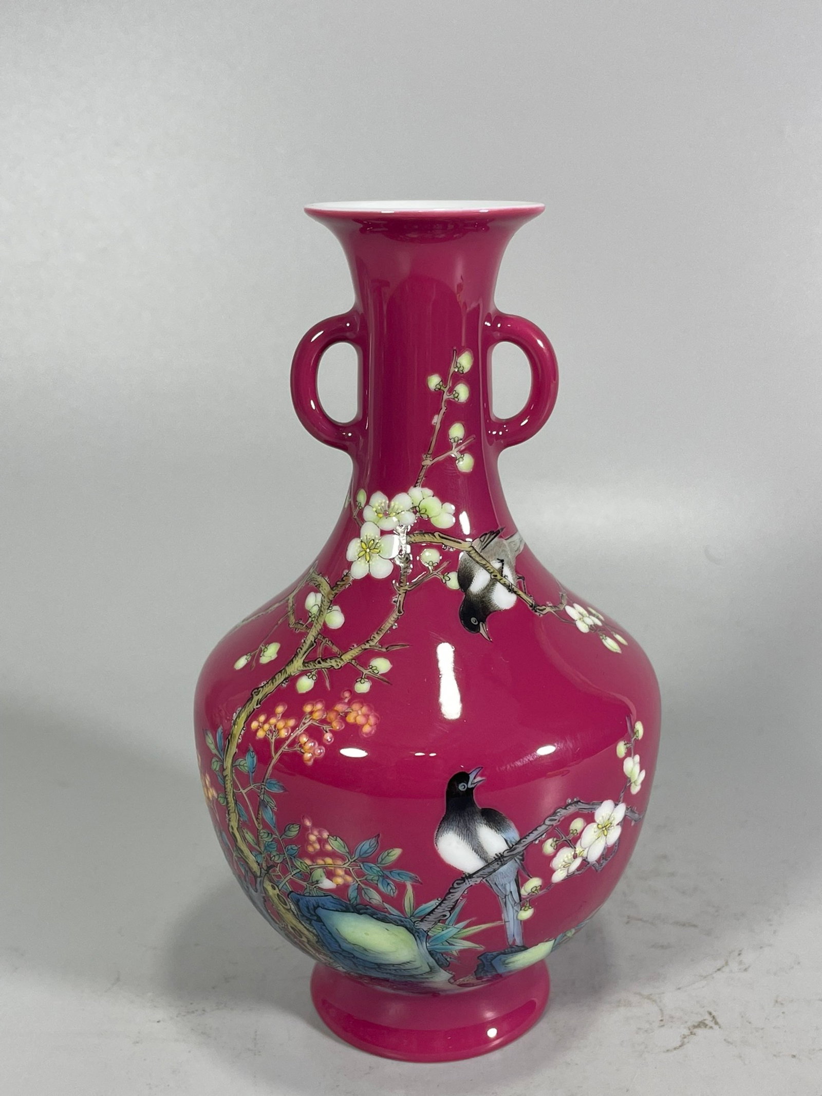 An Exquisite Ruby Red-Glazed Famille-Rose Flower and Bird Pattern Double-Ears Vase: An Exquisite Ruby Red-Glazed Famille-Rose Flower and Bird Pattern Double-Ears Vase,Qing Dynasty,China,Yongzheng Four-character Mark,Size:6.3inx3.7in 胭脂红粉彩花