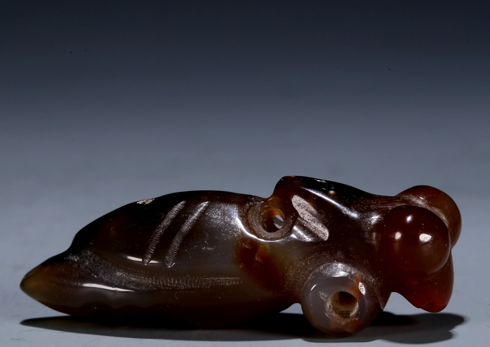 A Hongshan Culture Agate 'Ciacada' Pendant: A Hongshan Culture Agate 'Ciacada' Pendant Chinese Neolithic Period. Size:0.8inx2.6in