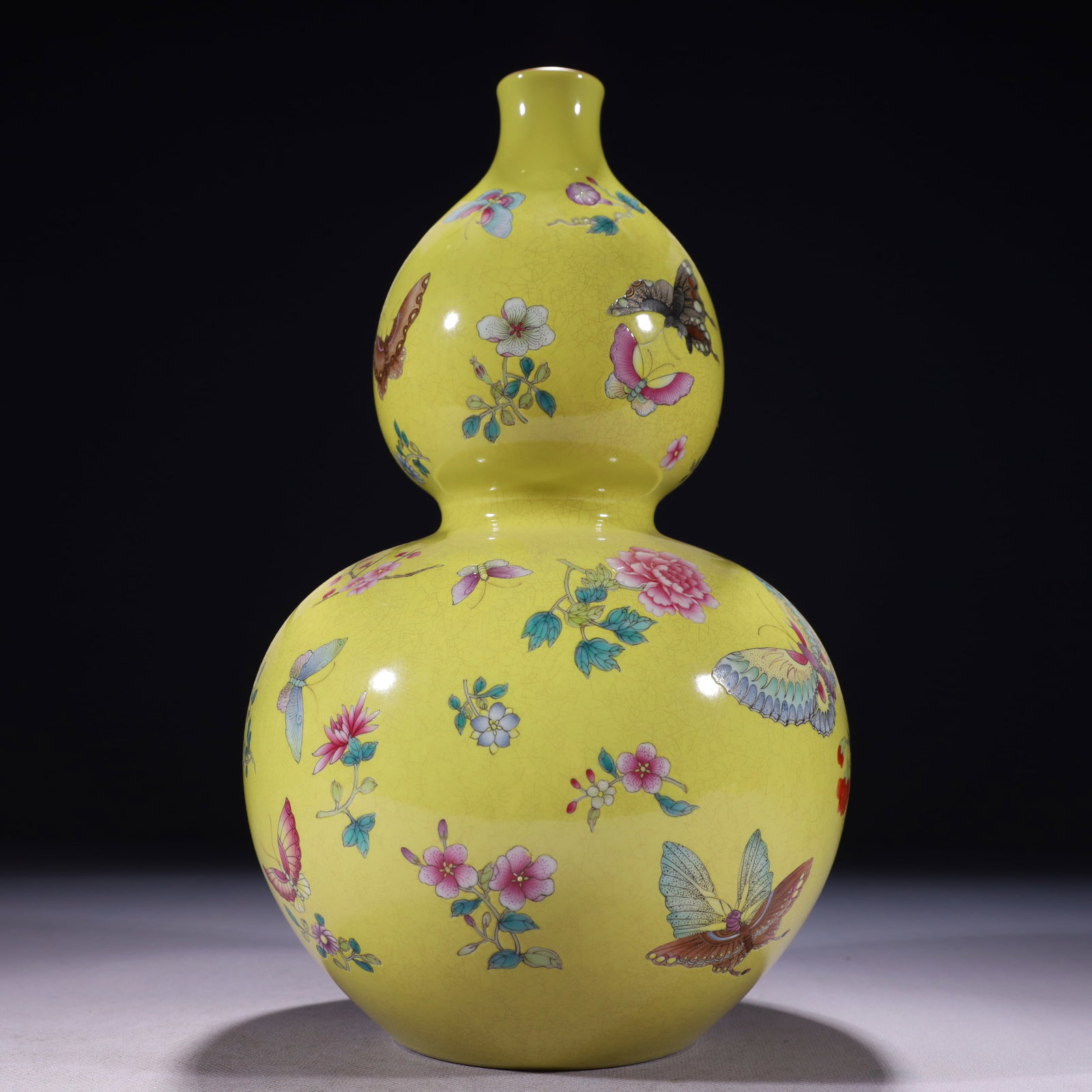 An Exquisite Yellow Ground Famille-Rose Painted Gold Flower and Butterfly Pattern Gourd-Shaped Vase (1 of 11)