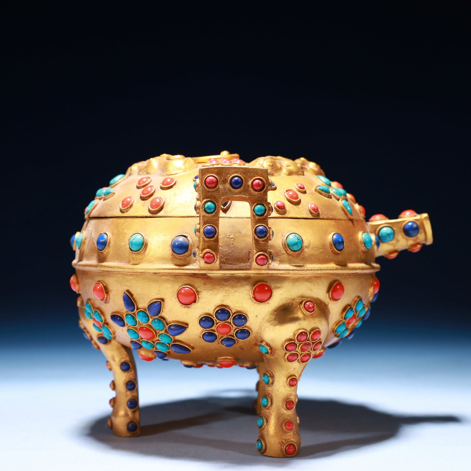 An Exquisite Gilt Bronze Double-Ears and Tripod Pot,Inlaid Gems: An Exquisite Gilt Bronze Double-Ears and Tripod Pot,Inlaid Gems,Qing Dynasty,China,Size:7.5inx6.7inx5.9in,Weight:750g 铜鎏金双耳三足壶,嵌宝&