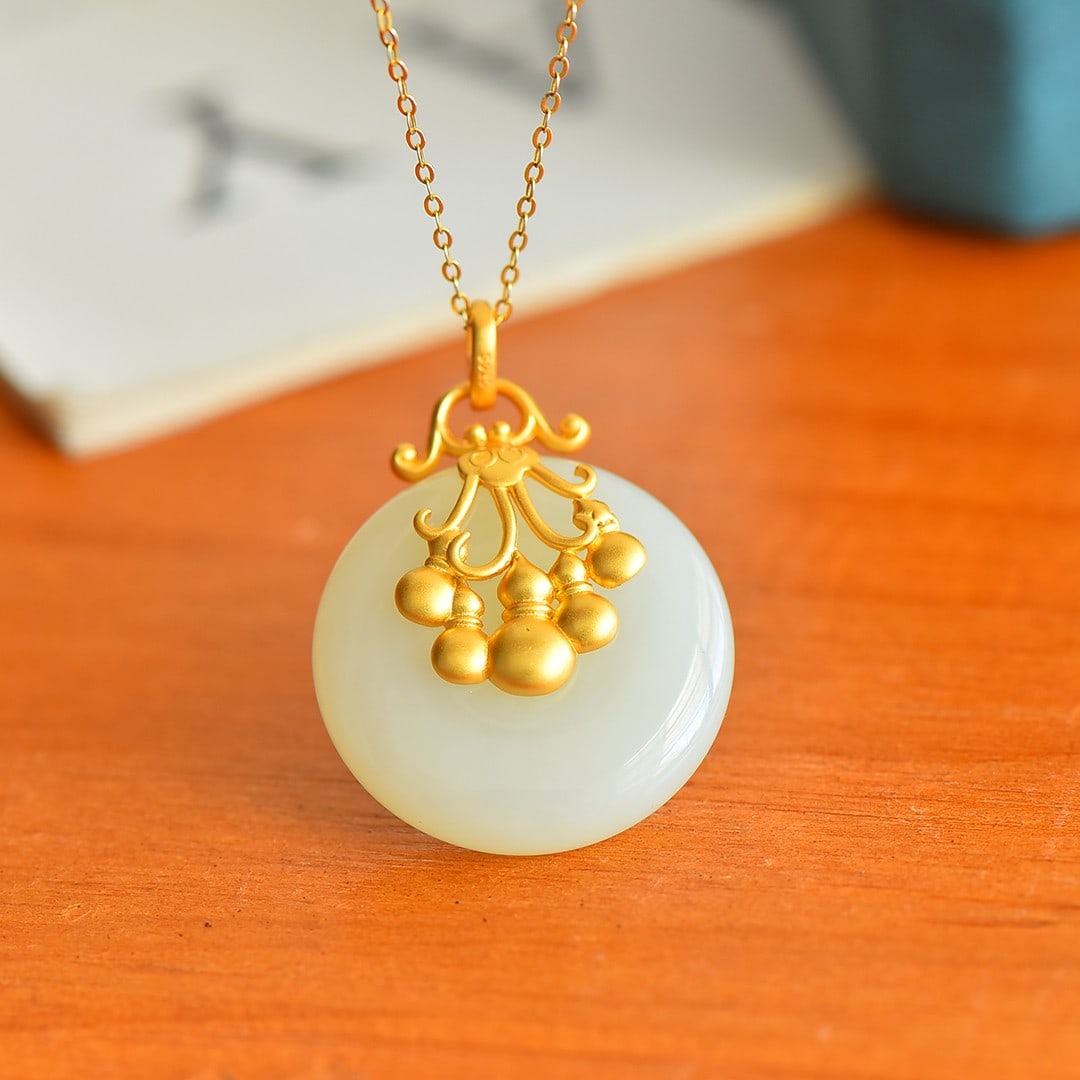 An Exquisite Sterling Silver-Gold Plated Inlaid White Jade Necklace: An Exquisite Sterling Silver-Gold Plated Inlaid White Jade Necklace,Size:24mmx26mm 纯银镀金镶白玉项链