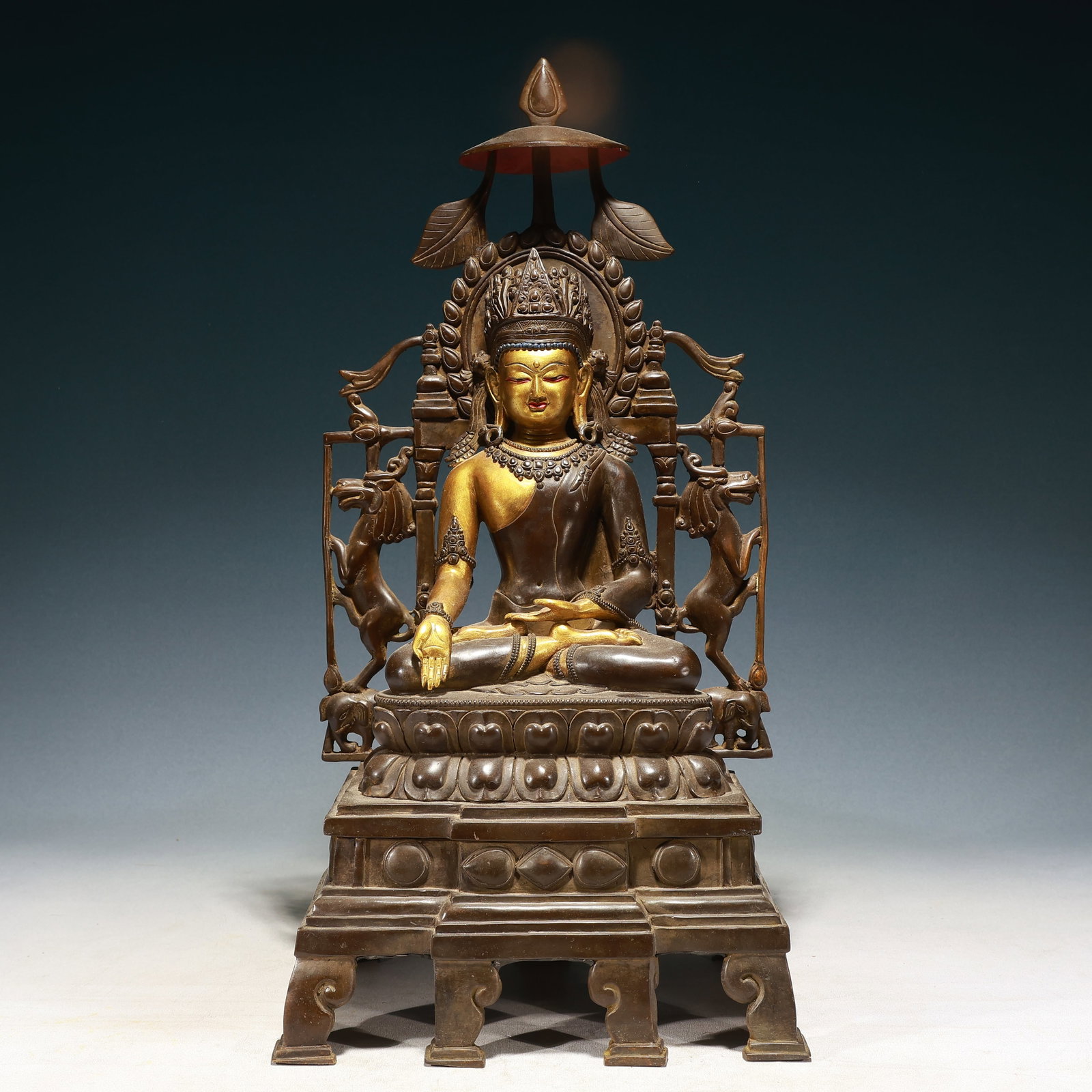 A Solemn Gilt Bronze Statue of Sakyamuni: A Solemn Gilt Bronze Statue of Sakyamuni,Qing Dynasty,China,Size:11.8inx8.3inx22.8in,Weight:14600g 铜鎏金释迦摩尼像,中国清代