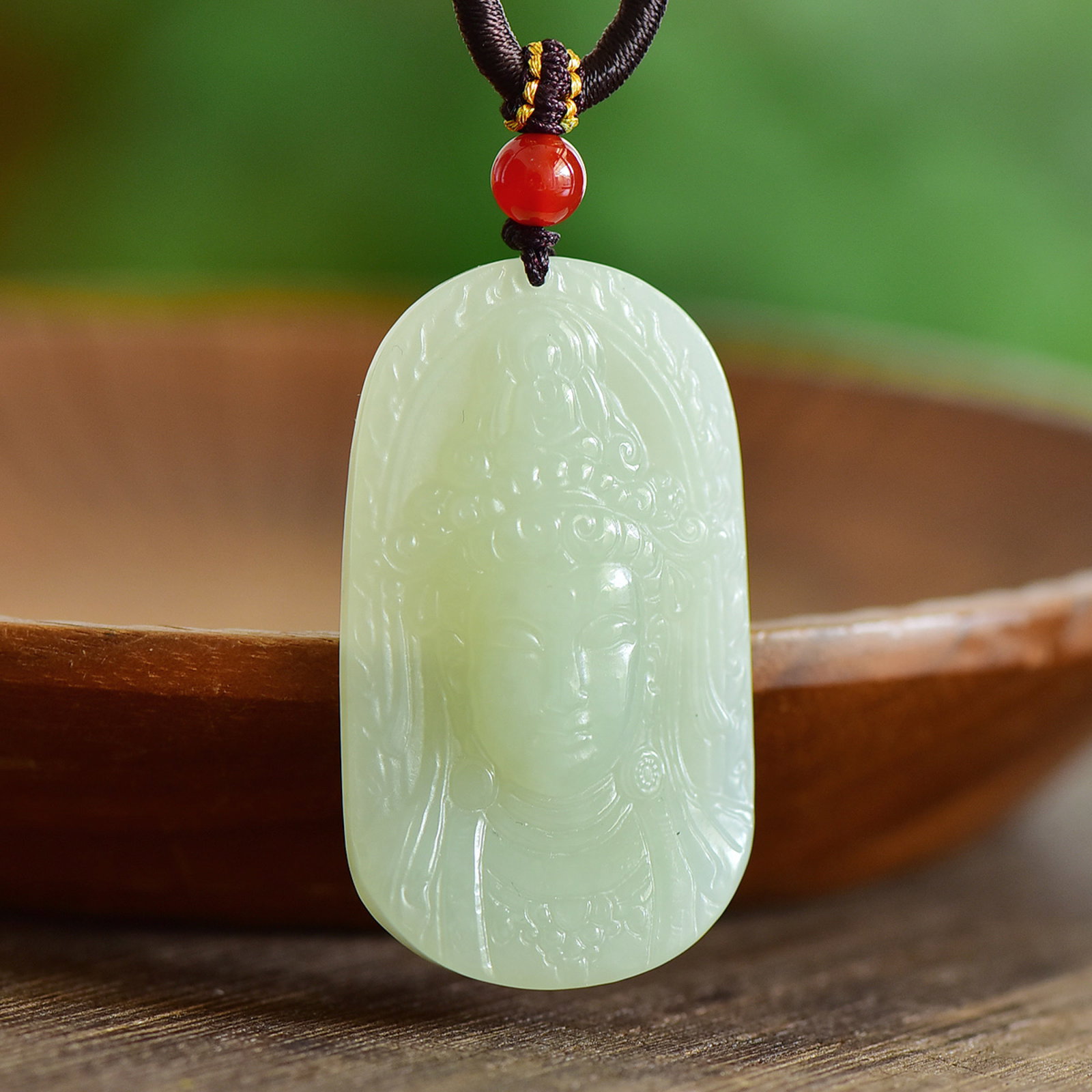 An Exquisite White Jade Avalokitesvara-head Pendant: An Exquisite White Jade Avalokitesvara-head Pendant,Size:50mmx30mm 寓意:吉祥 大慈大悲 普度众生