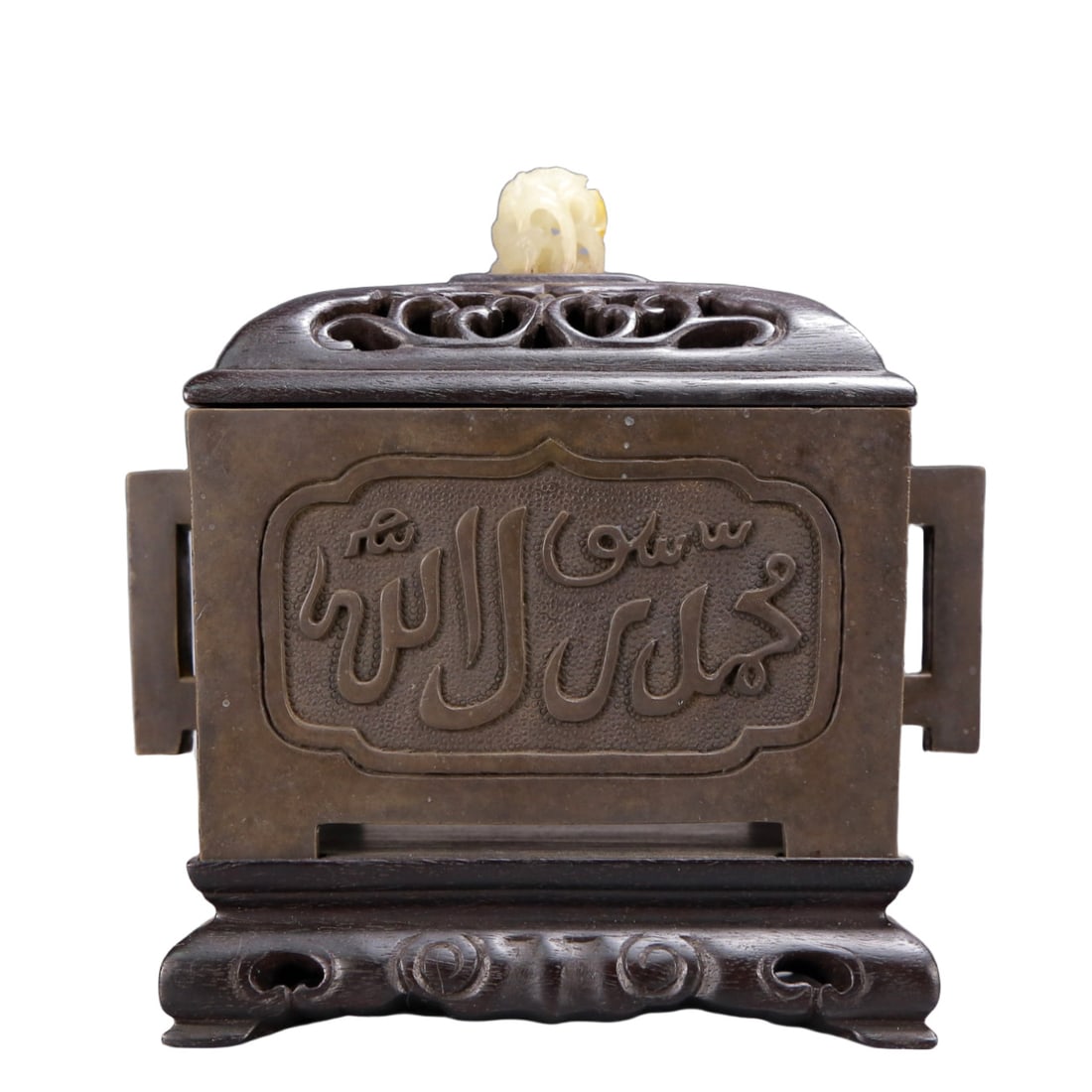 An Archaic Bronze ??Arabic?? Double-Ears Censer,with Zitanwood Inlaid White Jade Cover: An Archaic Bronze ‘Arabic’ Double-Ears Censer,with Zitanwood Inlaid White Jade Cover,Ming Dynasty, China,Zhengde Four-character Mark,Size:7.1inx4.1inx7.1in,Weight:3150g