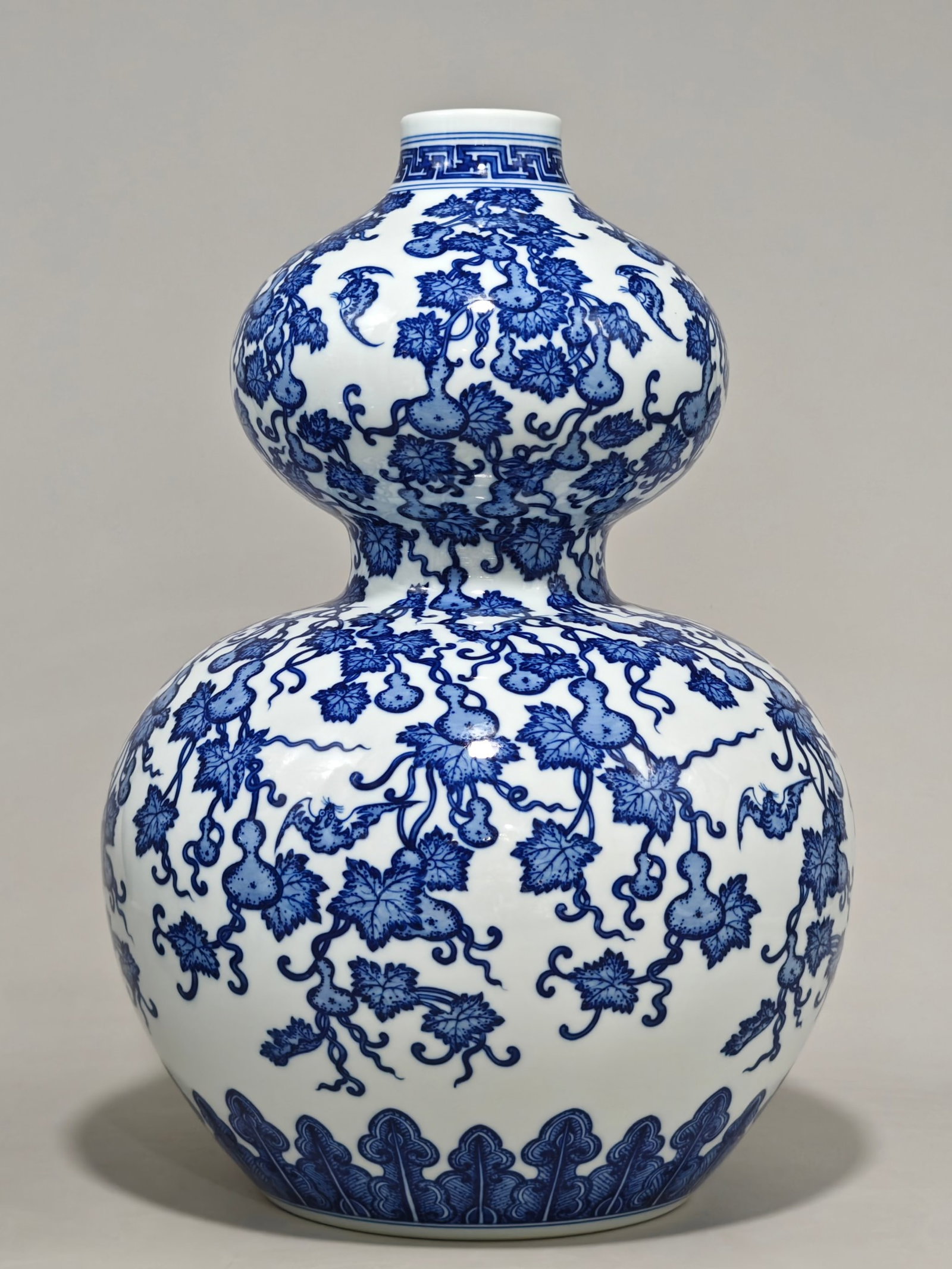A Huge Blue and White Gourd Pattern Gourd-Shaped Vase: A Huge Blue and White Gourd Pattern Gourd-Shaped Vase,Qing Dynasty,China,Qianlong Six-character Mark,Size:16.9inx12.2in