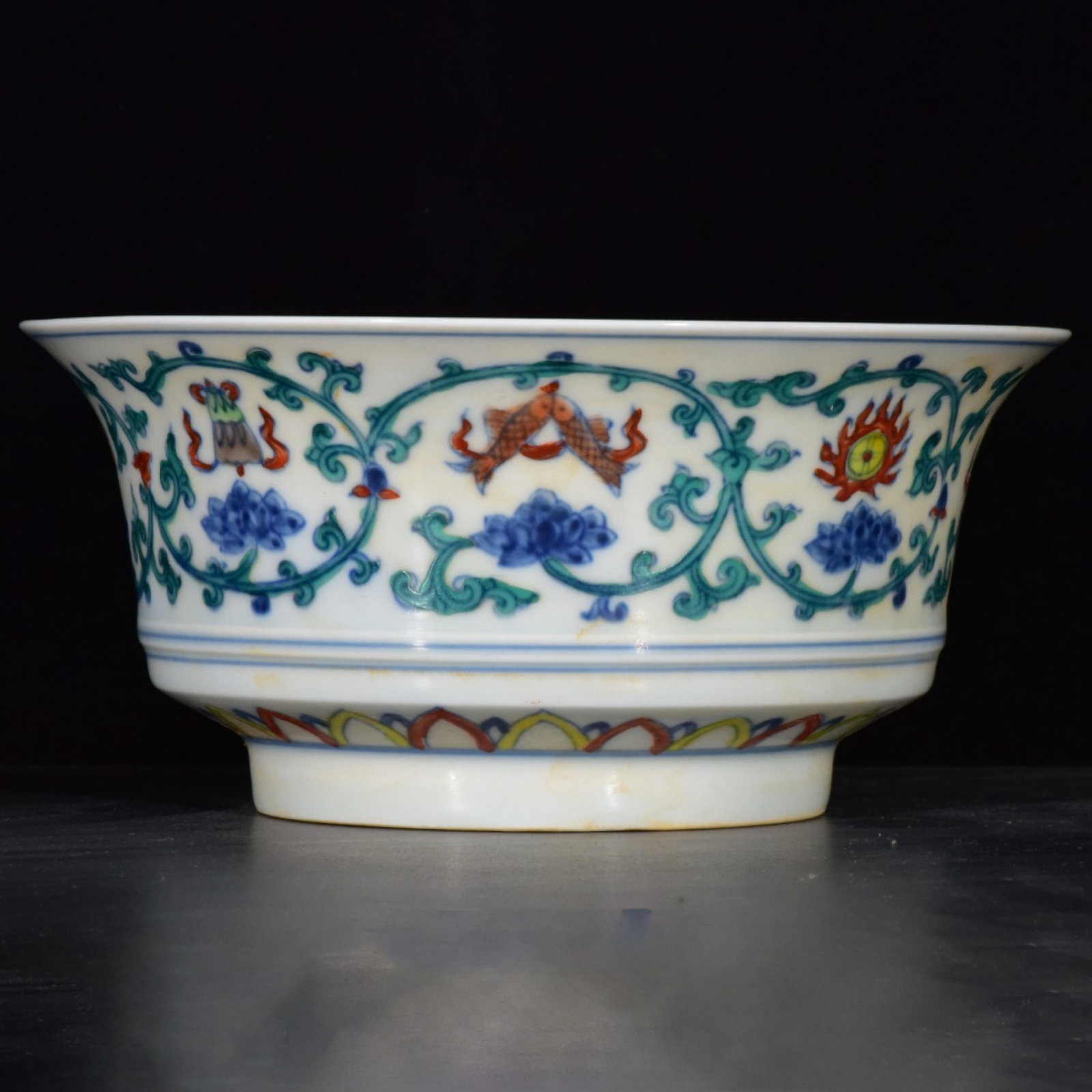An Exquisite Doucai Eight Treasures Pattern Bowl: An Exquisite Doucai Eight Treasures Pattern Bowl,Ming Dynasty,China,Xuande Six-character Mark,Size:3.1inx6.9in