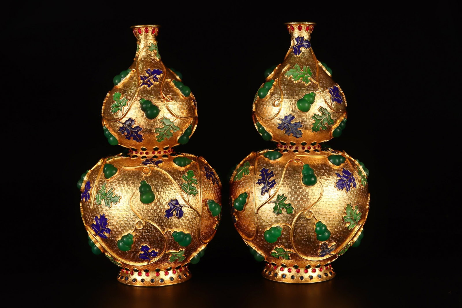 A Pair of Rare Gilt Bronze Inlaid Jadeite Leaf Pattern Gourd Vases,Inlaid Gems: A Pair of Rare Gilt Bronze Inlaid Jadeite Leaf Pattern Gourd Vases,Inlaid Gems,Qing Dynasty,China,Qianlong Four-character Mark,Size:11.8inx5.9in,Total Weight:2727g 一对铜鎏%