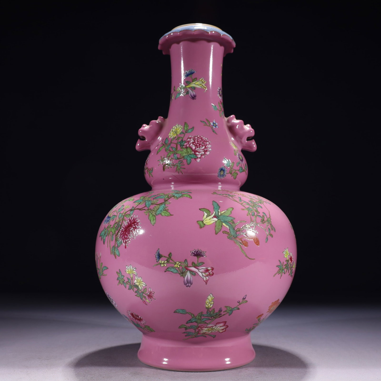 An Exquisite Pink Ground Famille-Rose Painted Gold Flower Pattern Beast-Ears Gourd-Shaped Vase: An Exquisite Pink Ground Famille-Rose Painted Gold Flower Pattern Beast-Ears Gourd-Shaped Vase,Qing Dynasty,China,Qianlong Six-character Mark,Size:7.1inx13in,Weight:2400g 粉地粉ô