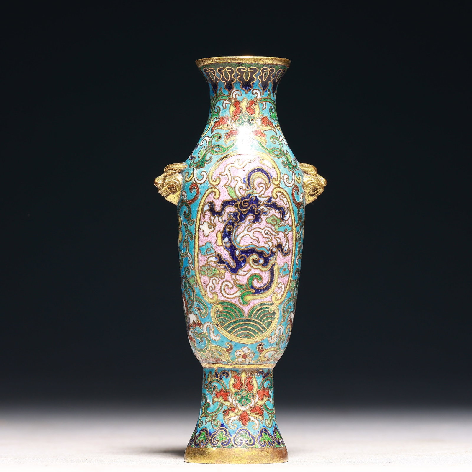 An Exquisite Cloisonne Lotus and Dragon Pattern Beast-Ears Vase: An Exquisite Cloisonne Lotus and Dragon Pattern Beast-Ears Vase,Qing Dynasty,China,Size:2inx1.4inx4.7in,Weight:200g 景泰蓝缠枝莲龙纹兽耳