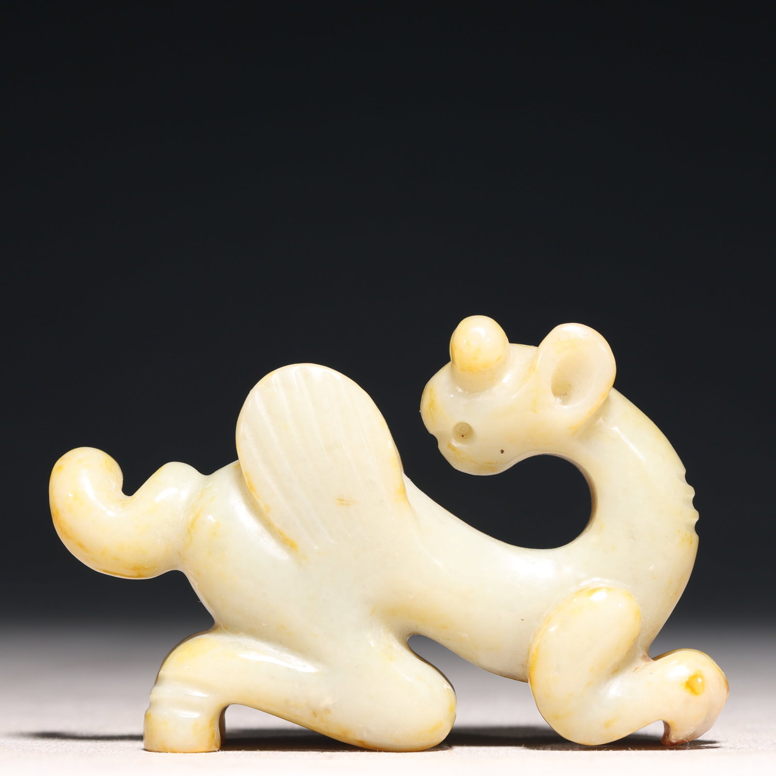 An Archaic Hongshan Culture White Jade Beast Pendant: An Archaic Hongshan Culture White Jade Beast Pendant,Ancient Time, China,Size:3.3inx0.8inx2.3in,Weight:149g