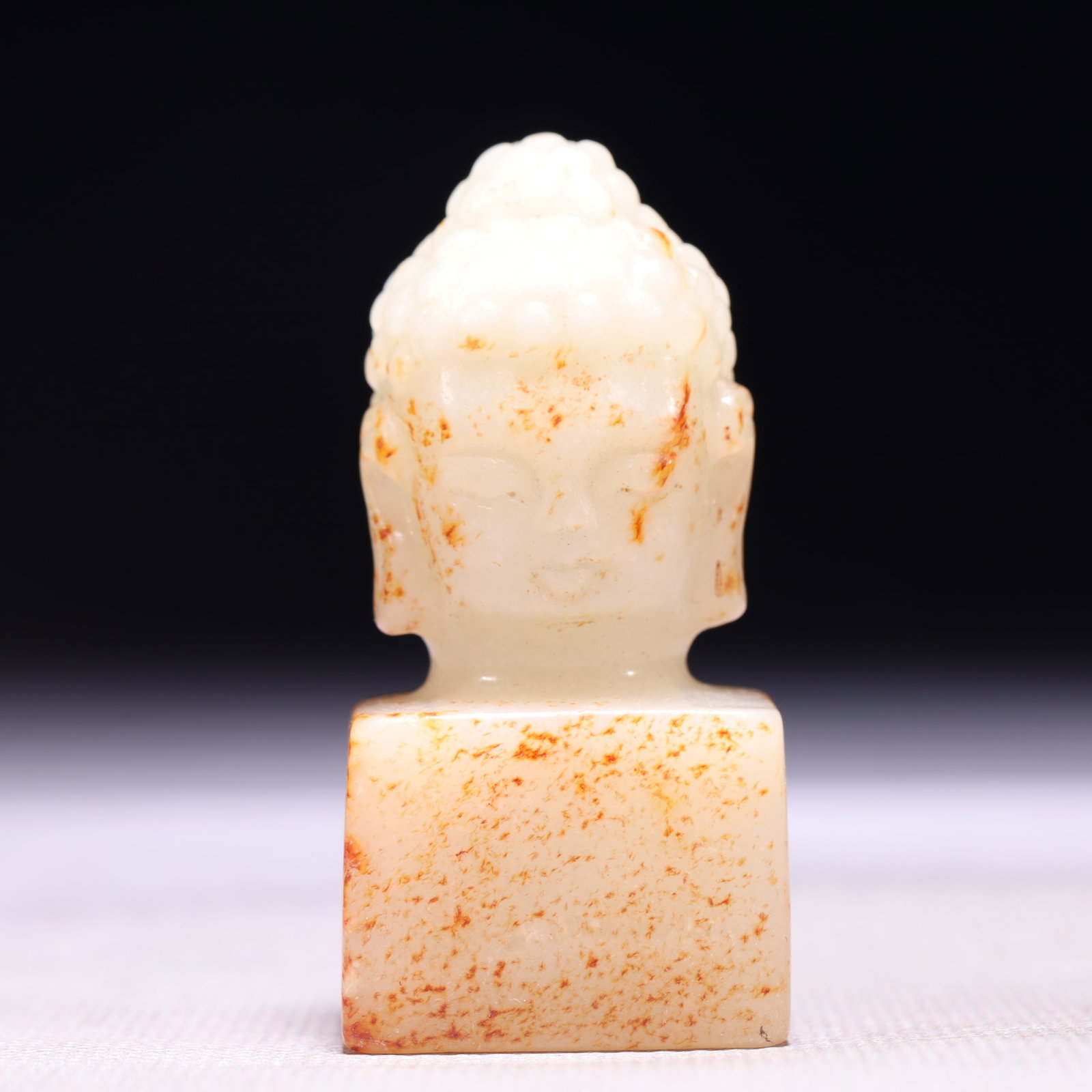 An Exquisite White Jade Statue of Buddha Head Seal: An Exquisite White Jade Statue of Buddha Head Seal,Qing Dynasty,China,Size:1.1inx2.2in,Weight:81g 白玉佛头像印章,中国清代