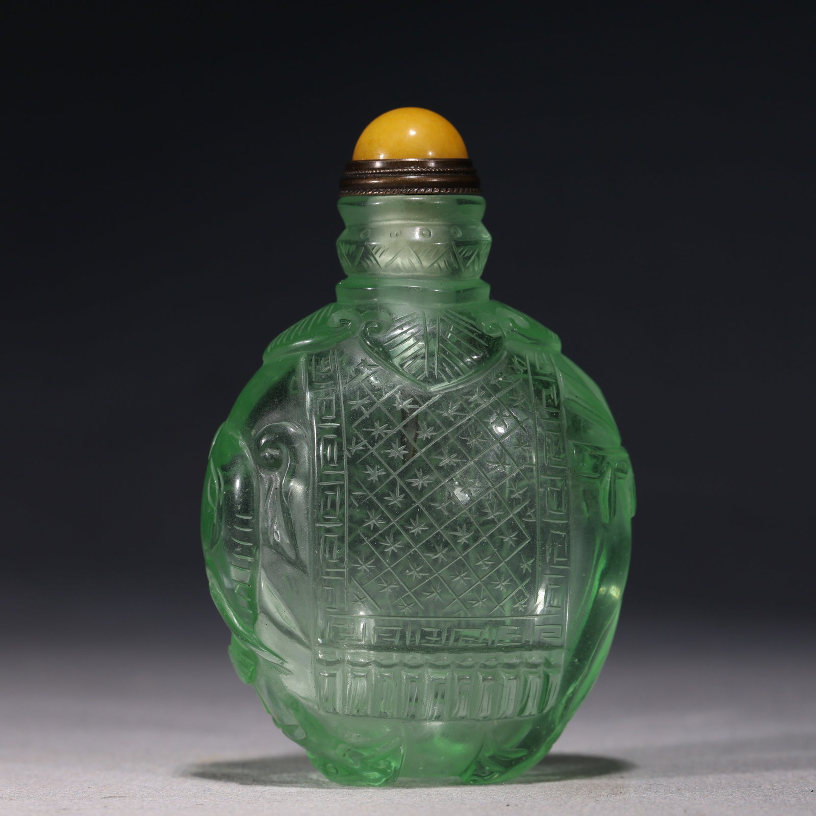An Exquisite Emerald Green Glass Elephant of Peace Pattern Snuff Bottle (1 of 6)