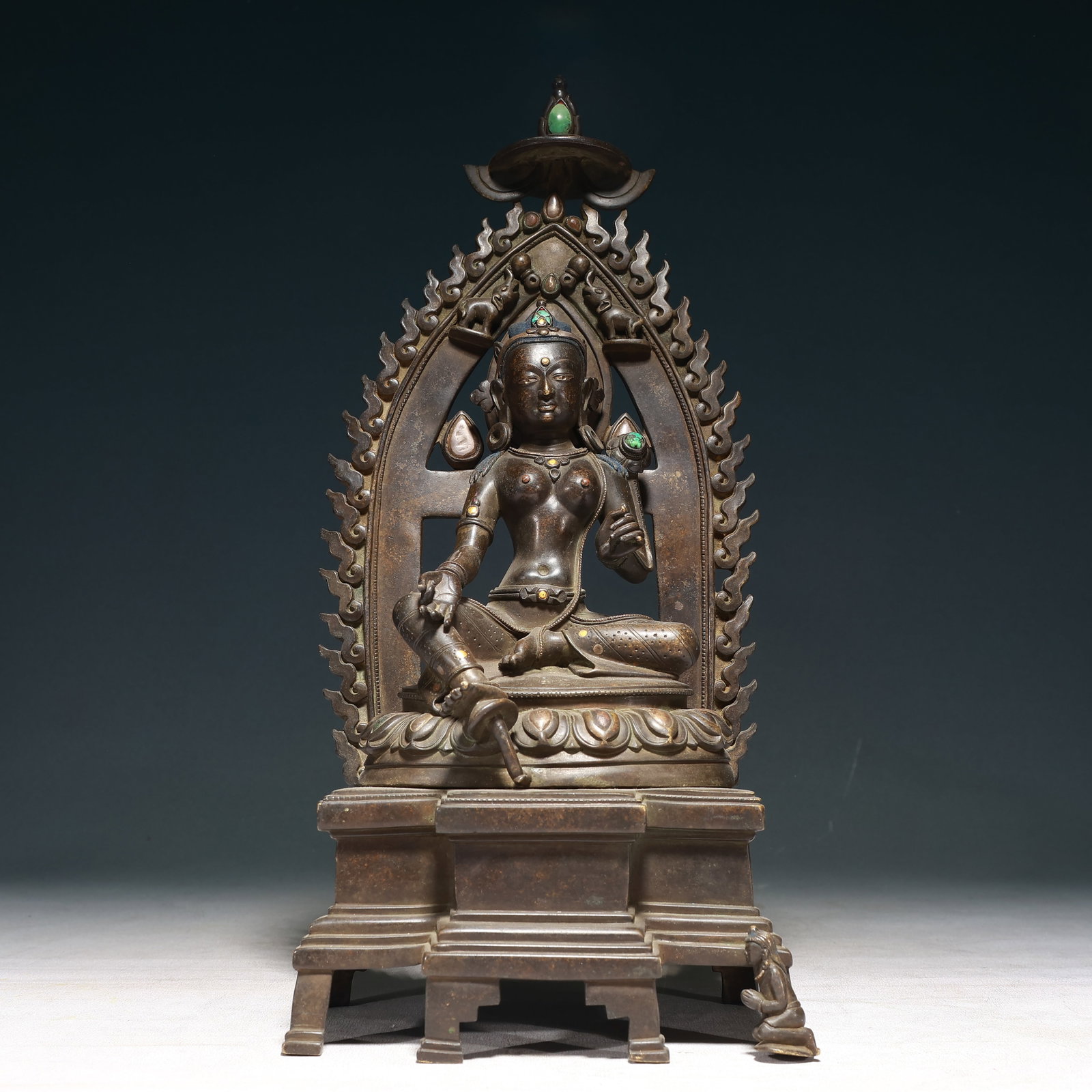 A Solemn Bronze Inlaid Silver Statue of Tara,With Inscription: A Solemn Bronze Inlaid Silver Statue of Tara,With Inscription,Qing Dynasty, China,Size:6.7inx4.7inx14.6in,Weight:3200g 铜嵌银度母像,带铭文,中
