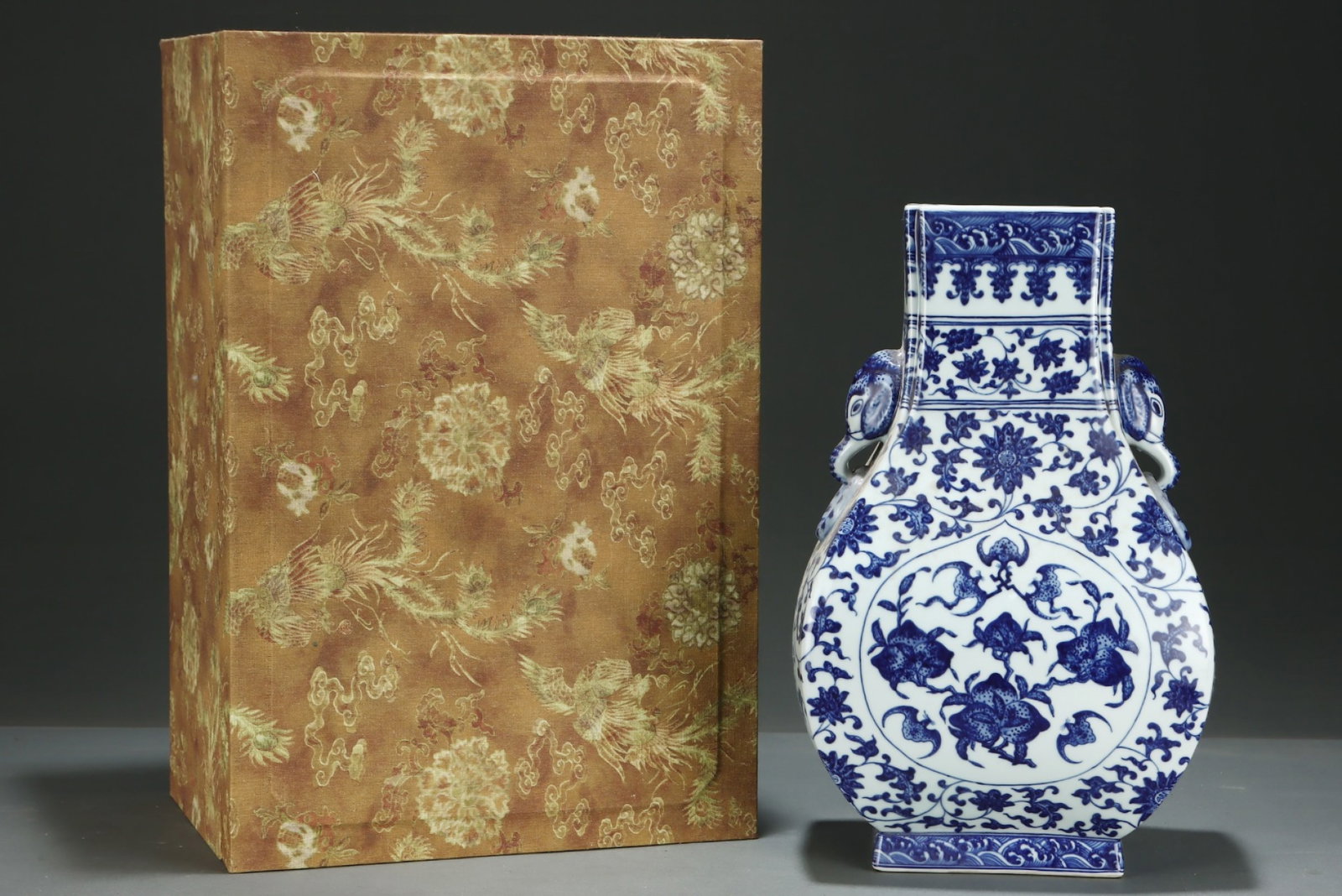A Rare Blue and White Bats and Peach Pattern Elephant-Ears Vase: A Rare Blue and White Bats and Peach Pattern Elephant-Ears Vase,Qing Dynasty,China,Qianlong Six-character Mark,Size:14.3inx8.8in 青花福寿纹象耳瓶,ߑ
