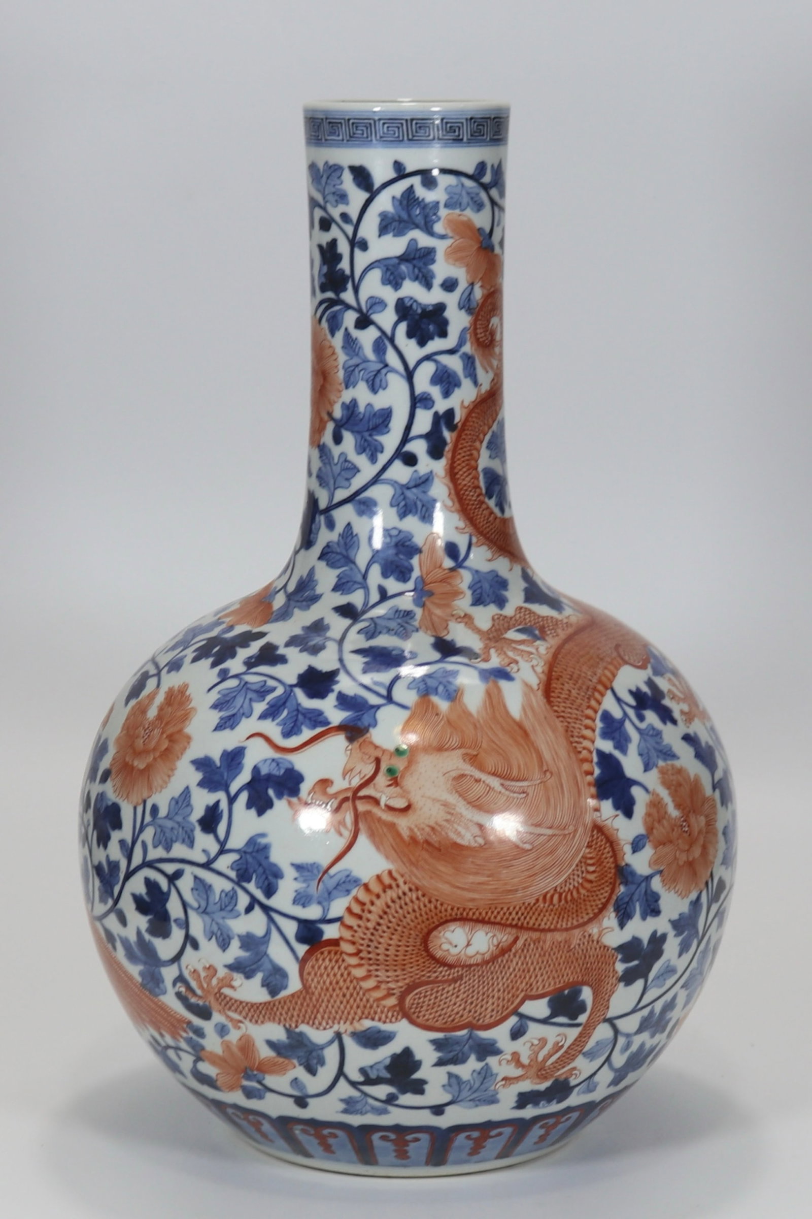 A fine doucai dragon, phoenix and floral celestial globe vase: A fine doucai dragon, phoenix and floral celestial globe vase, Qing Dynasty, China, with six-character Qianlong reign mark, Size:16.9inx3.3in