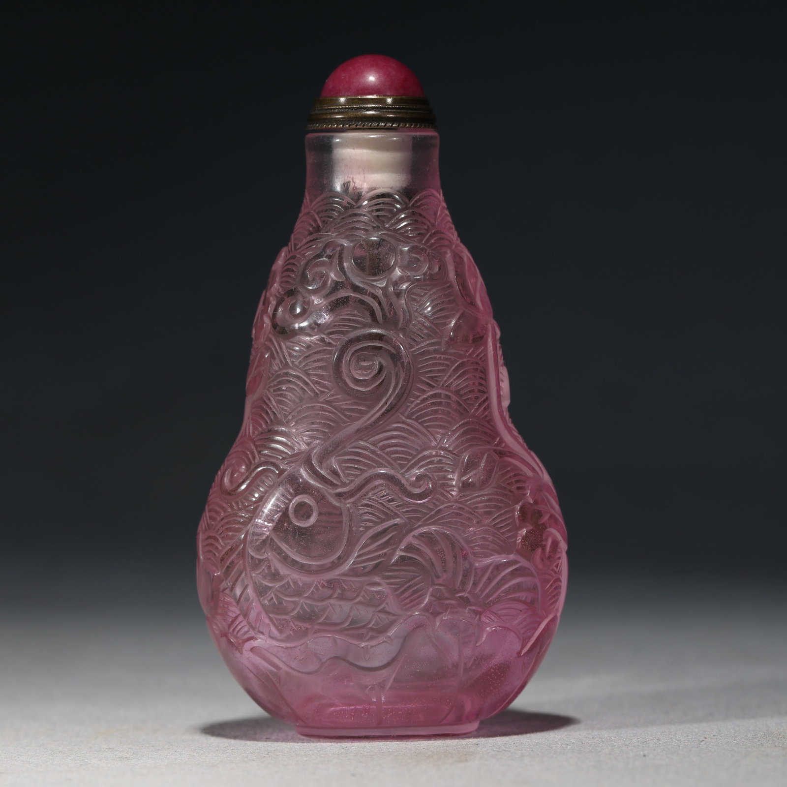 An Exquisite Pink Glass Gourd-shaped Sea Water Fish Pattern Snuff Bottle: An Exquisite Pink Glass Gourd-shaped Sea Water Fish Pattern Snuff Bottle,Qing Dynasty, China,Qianlong Four-character Mark,Size:2in×1in×3.5in