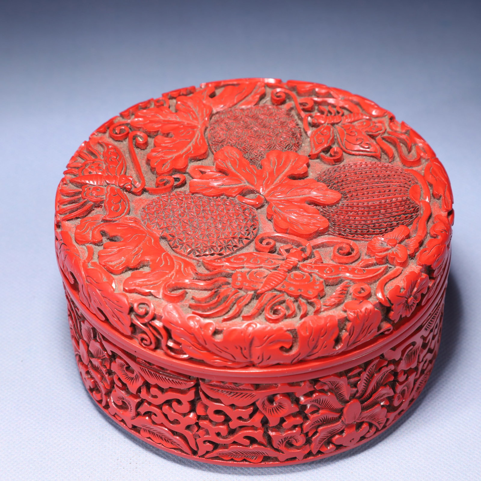 An Exquisite Carved Red Lacquer Litchi Pattern Box with Cover: An Exquisite Carved Red Lacquer Litchi Pattern Box with Cover,Qing Dynasty,China,Qianlong Four-character Mark,Size:5.5inx3in,Weight:500g 剔红漆荔枝纹盖盒