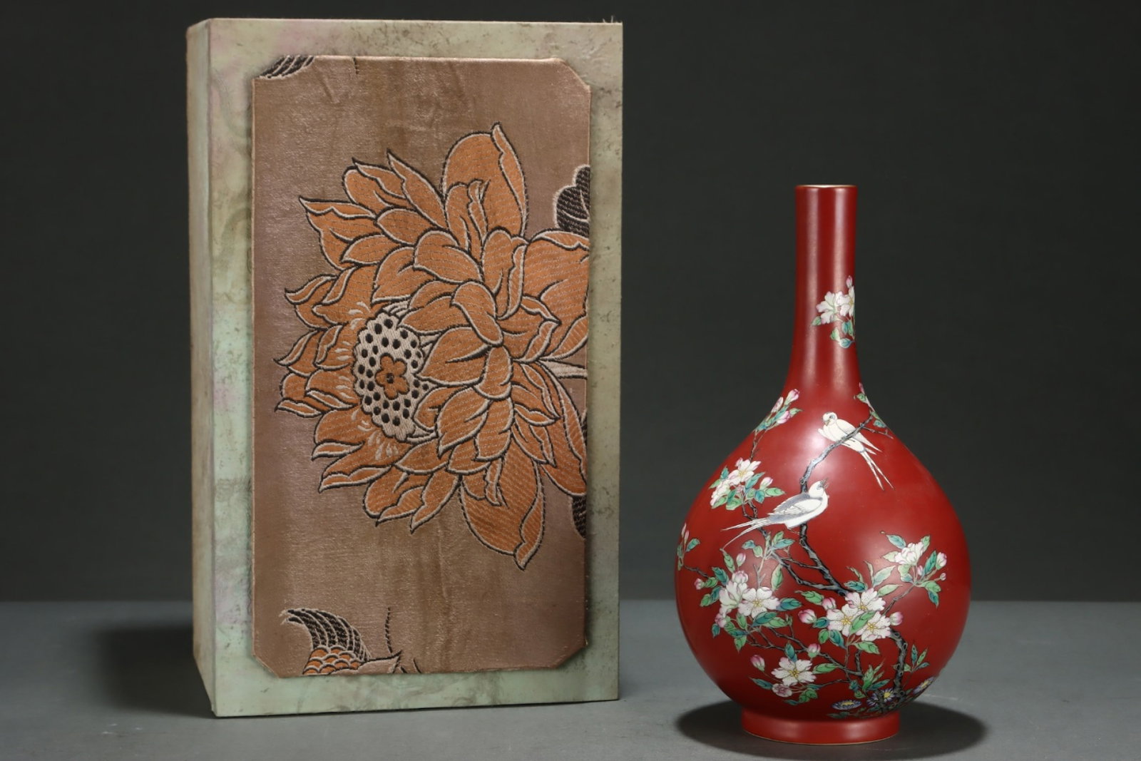 An Exquisite Coral Red Glazed Flower and Bird Pattern Vase: An Exquisite Coral Red Glazed Flower and Bird Pattern Vase,Qing Dynasty,China,Qianlong Six-character Mark,Size:11.3inx6.1in 珊瑚红花鸟纹瓶,中国