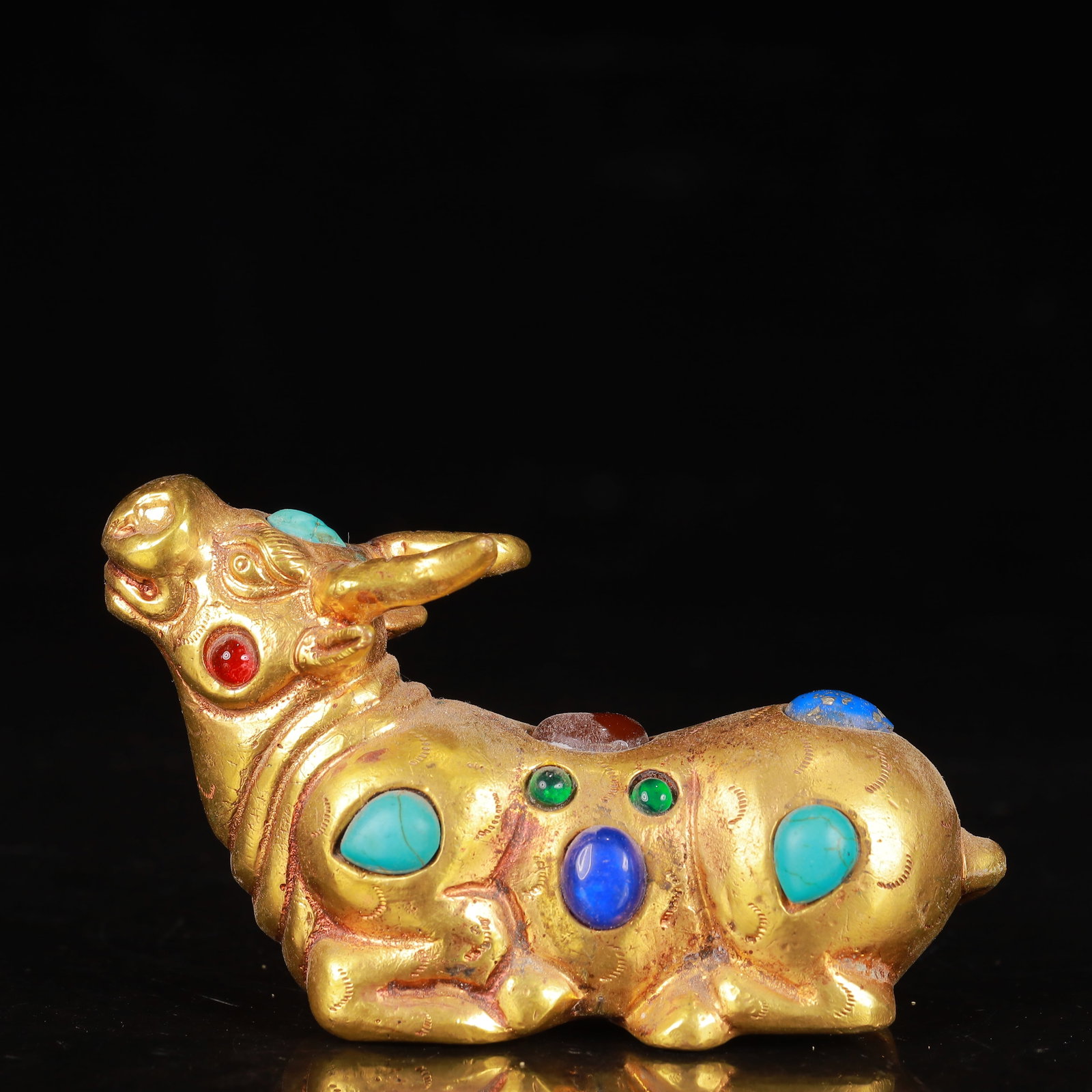 An Exquisite Gilt Bronze Buffalo Ornament,Inlaid Turquoise: An Exquisite Gilt Bronze Buffalo Ornament,Inlaid Turquoise,Qing Dynasty,China,Size:3.5inx1.2inx2in,Weight:446g