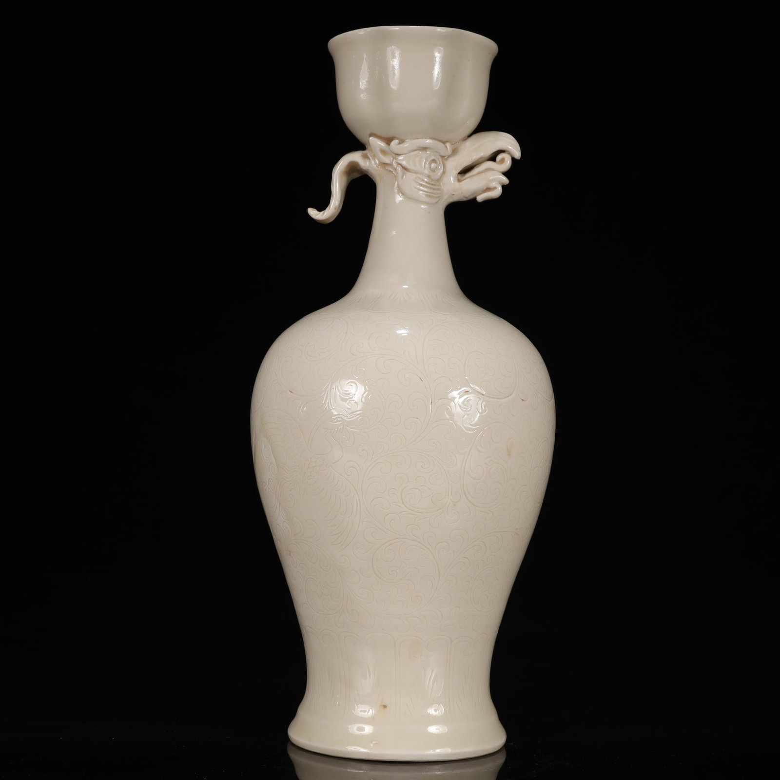 A Rare Ding yao Flower and Phoenix Pattern Vase: A Rare Ding yao Flower and Phoenix Pattern Vase,Song Dynasty, China,Size:5.1inx5.1inx11.8in,Weight:950g 定窑花卉凤纹瓶，中国宋代