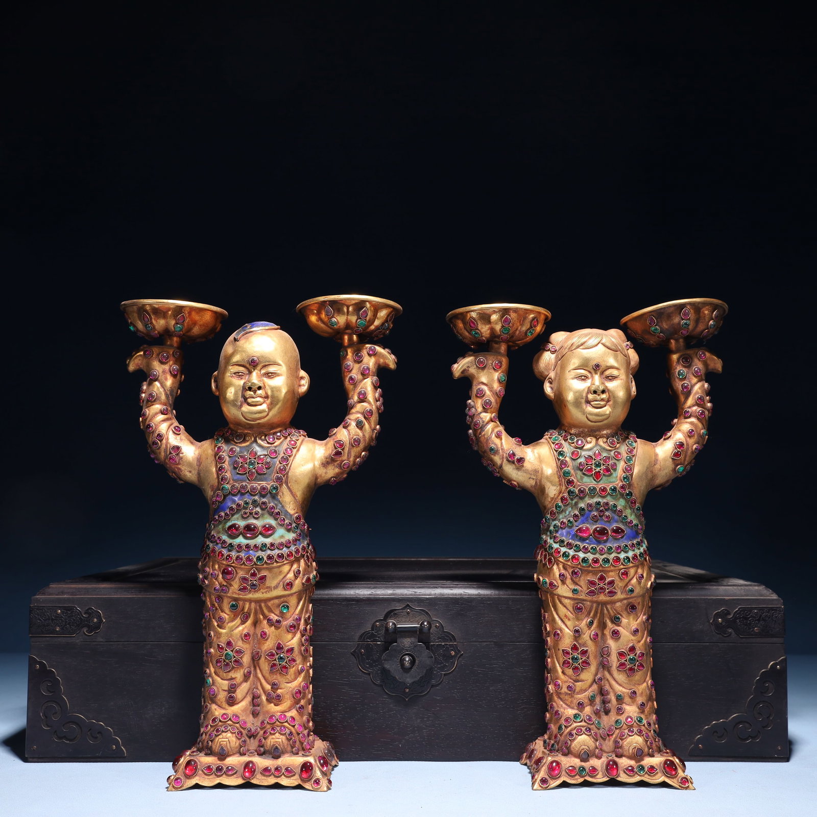 A Pair of Exquisite Gilt Bronze Figure Candlestick, Inlaid Gems: A Pair of Exquisite Gilt Bronze Figure Candlestick, Inlaid Gems, Tang Dynasty,China, Zhenguan Four-character Mark, Size:11inx7.1inx11.8in,(Box)19.7inx14.6inx4.7in,Weight:2100g 一对铜