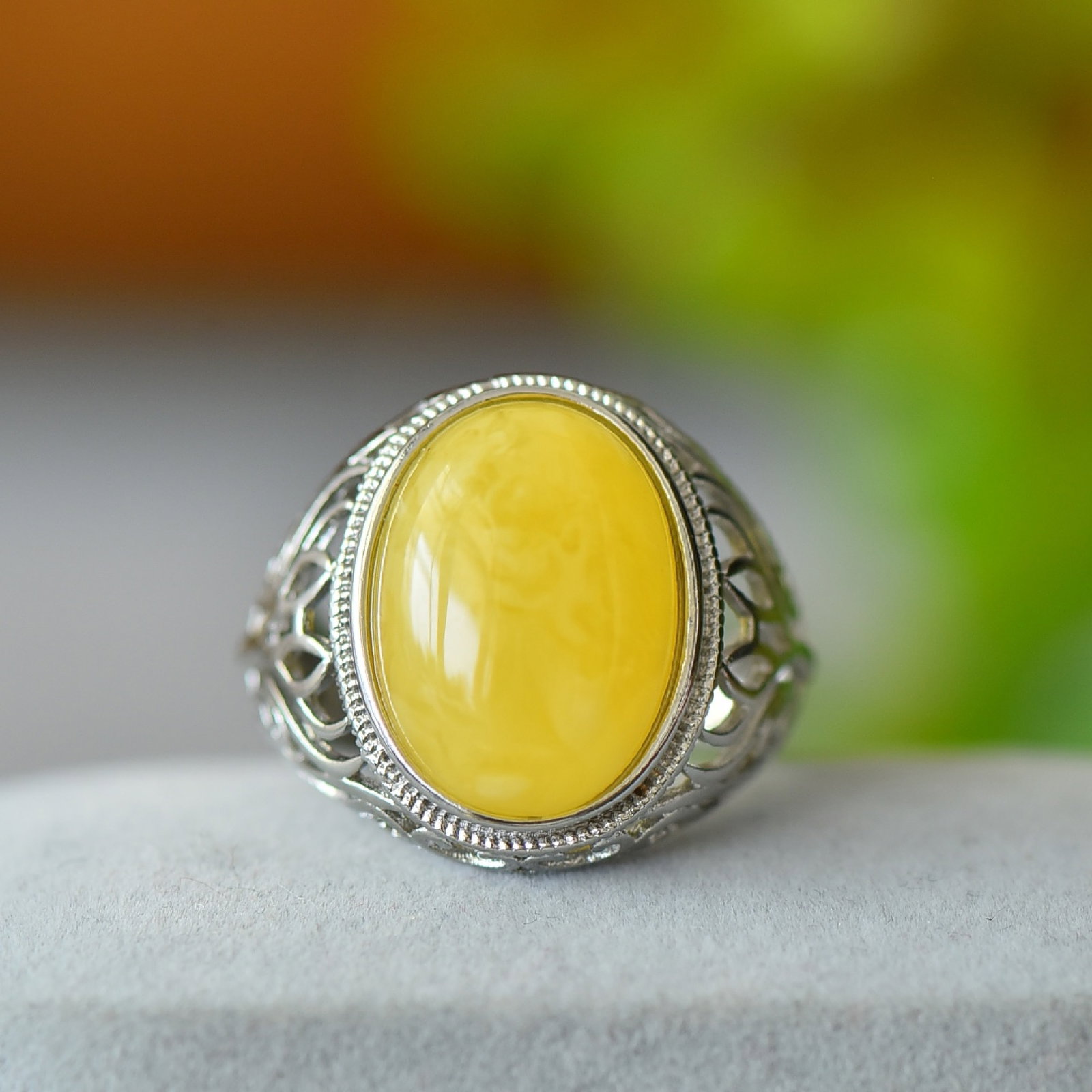 An Exquisite Bronze Inlaid Beeswax Ring: An Exquisite Bronze Inlaid Beeswax Ring,Size:5.1inx7.1in 铜镶蜜蜡戒指
