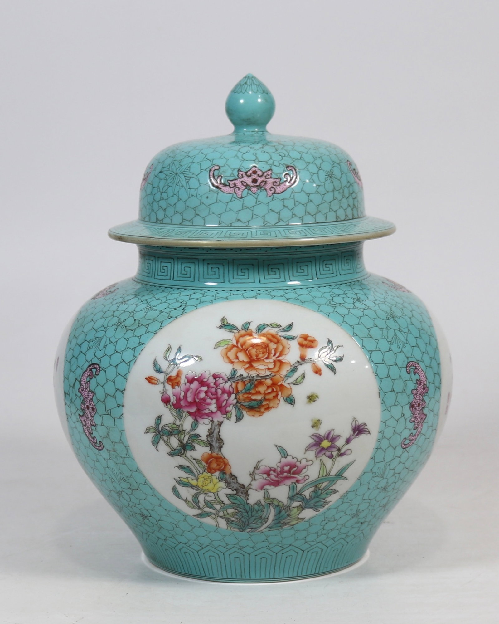A fine turquoise green ground ice-crackle prunus covered jar with reserved seasonal flower and: A fine turquoise green ground ice-crackle prunus covered jar with reserved seasonal flower and poetic panels, Qing Dynasty, China, with six-character Qianlong reign mark, Size:9.8inx8.7inx4.7in