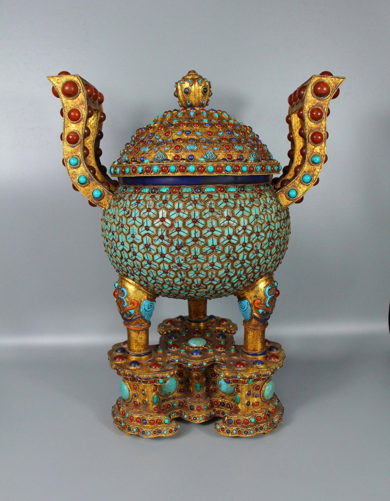 A Huge Gilt Bronze Double-Ears Tripod Censer,Inlaid Turquoise and Agate,With Base: A Huge Gilt Bronze Double-Ears Tripod Censer,Inlaid Turquoise and Agate,With Base,Qing Dynasty,China,Size:13.2inx8.7inx17.7in,Weight:8600g 铜鎏金双耳三足Ɖ