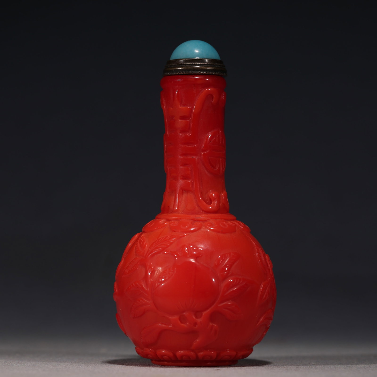 An Exquisite Coral Red Glass Longevity Character Pattern Snuff Bottle: An Exquisite Coral Red Glass Longevity Character Pattern Snuff Bottle,Qing Dynasty, China,Yongzheng Four-character Mark,Size:1.8in×1.8in×3.5in