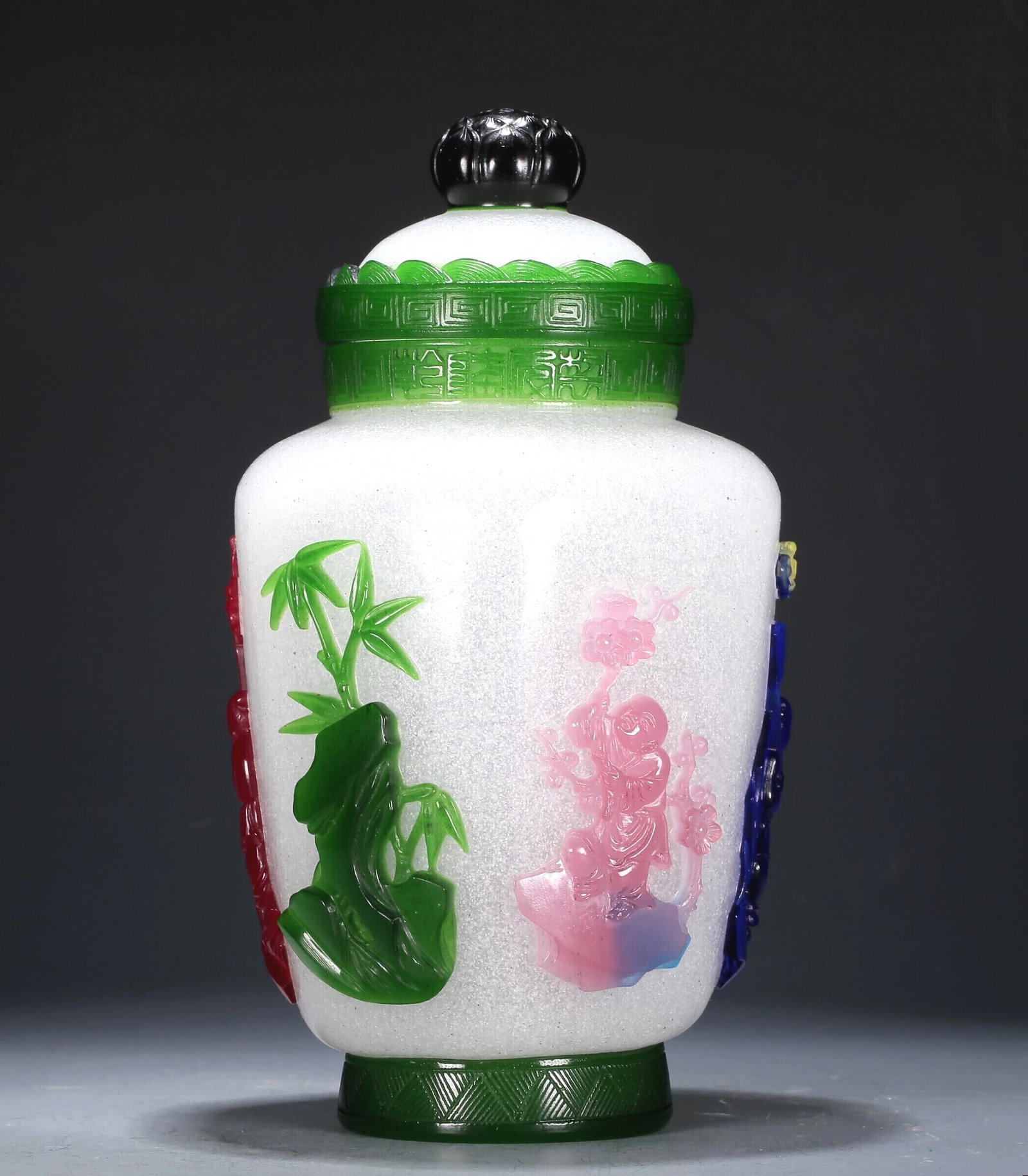 A Multi-Color Overlay White Glass 'Figure' Jar And Cover: A Multi-Color Overlay White Glass 'Figure' Jar And Cover. The top is painted with a key-fret border, body with figures and bamboo. Chinese Qing Dynasty. Qianlong Four-Character Mark. Size:4.5inx8.5in