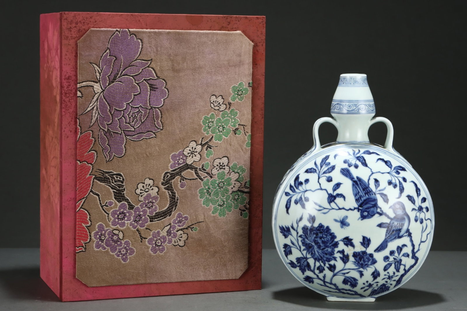 A Rare Blue and White Flower and Bird Pattern Double-Ears Vase: A Rare Blue and White Flower and Bird Pattern Double-Ears Vase,Ming Dynasty,China,Size:11.9inx8.5in 青花花鸟纹双耳瓶,中国明代