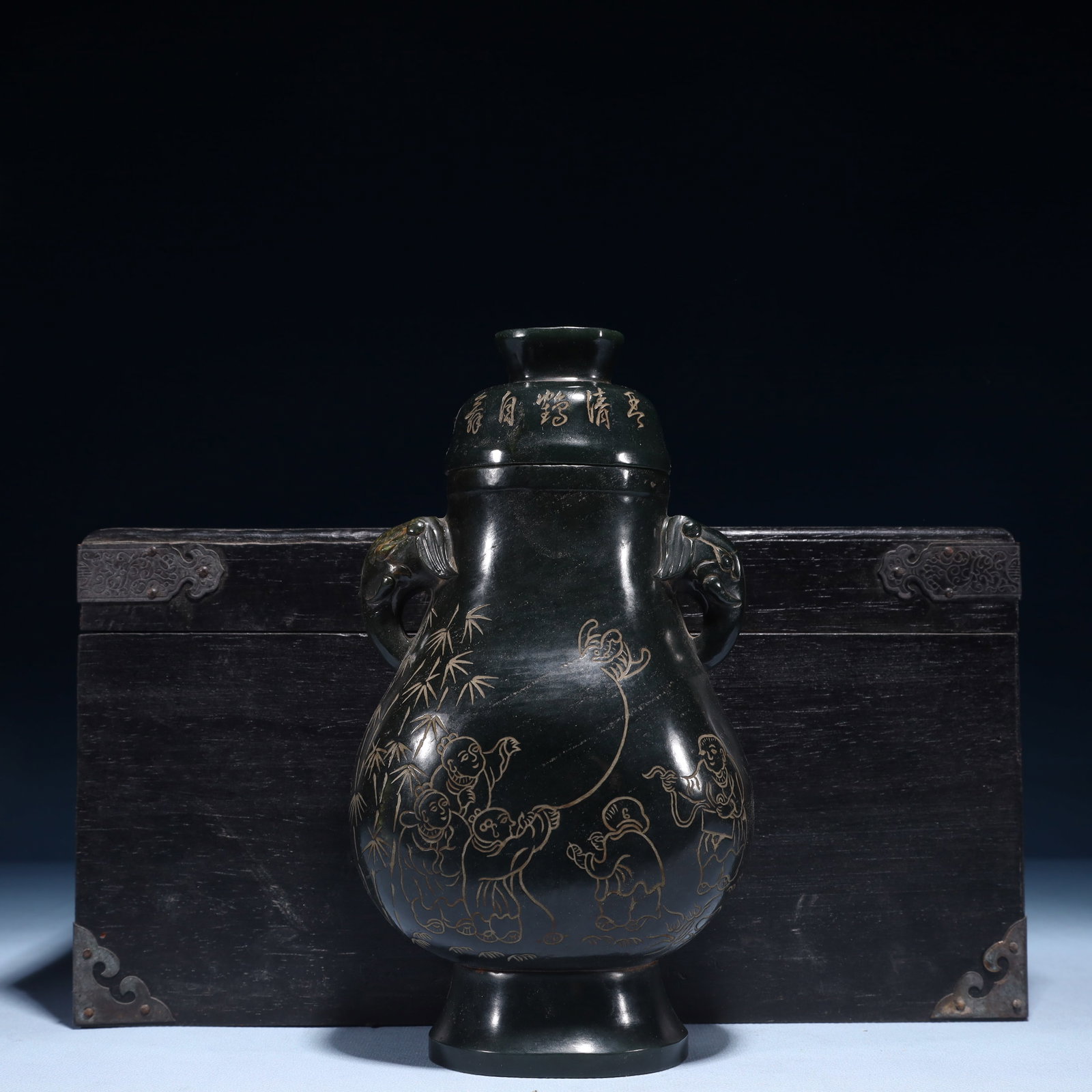 An Exquisite Jasper Figure Pattern Elephant-Ears Vase: An Exquisite Jasper Figure Pattern Elephant-Ears Vase, Qing Dynasty,China, Qianlong Four-character Mark, Size:4.7inx3.1inx9.1in,(Box)12.6inx7.5inx6.7in,Weight:1200g