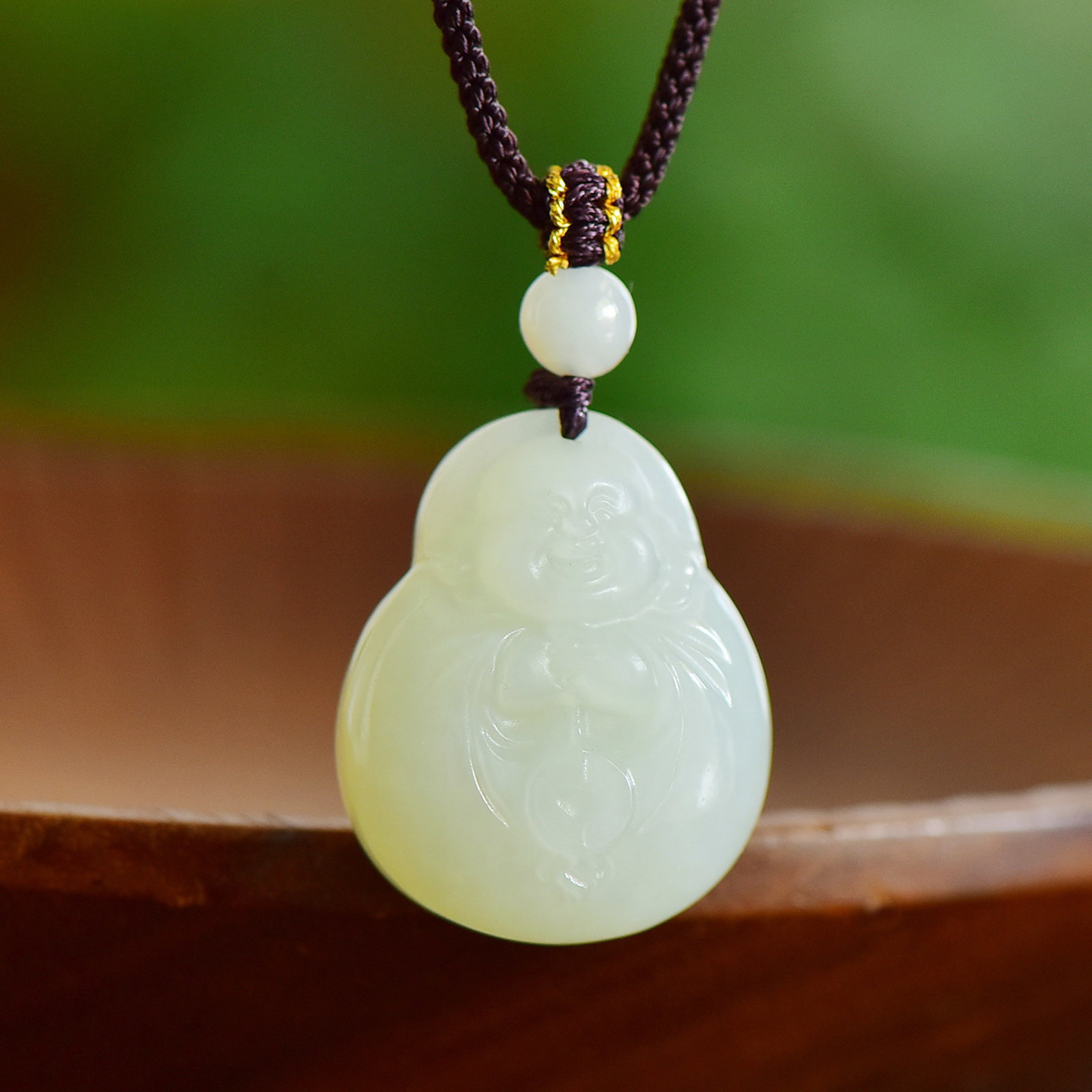 An Exquisite White Jade Maitreya Buddha Pendant: An Exquisite White Jade Maitreya Buddha Pendant,Size:28mmx24mmx12mm 寓意:吉祥 心怀天下 能容天下事