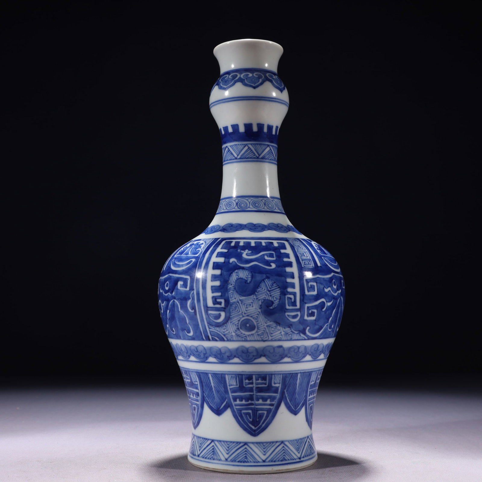 An Exquisite Blue and White Beast-Face Pattern Vase: An Exquisite Blue and White Beast-Face Pattern Vase,Qing Dynasty,China,Qianlong Six-character Mark,Size:4.7inx11.4in,Weight:900g