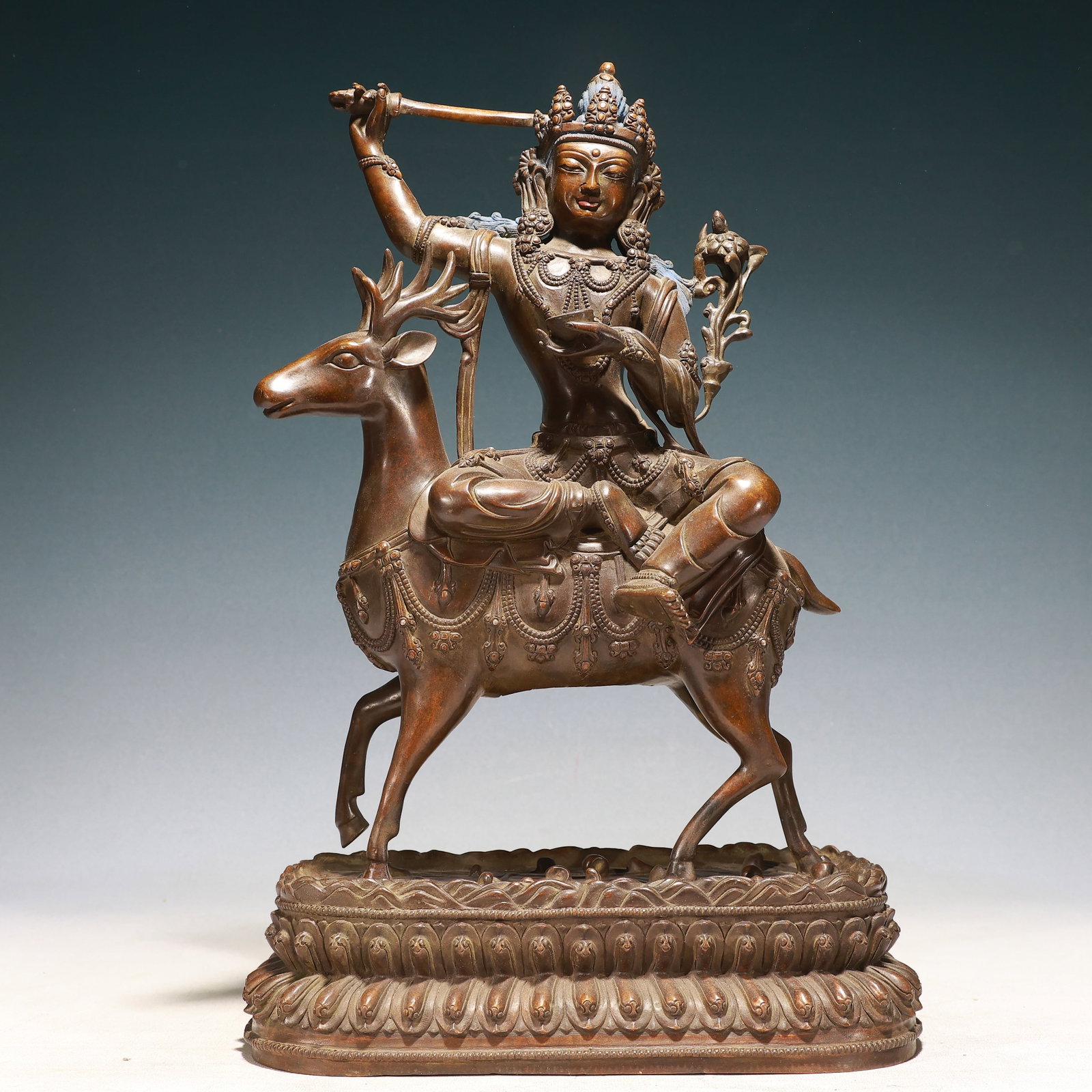 A Solemn Bronze Statue of Manjusri Rides the Deer: A Solemn Bronze Statue of Manjusri Rides the Deer,Qing Dynasty,China,Size:11.4inx5.1inx18.1in,Weight:10100g
