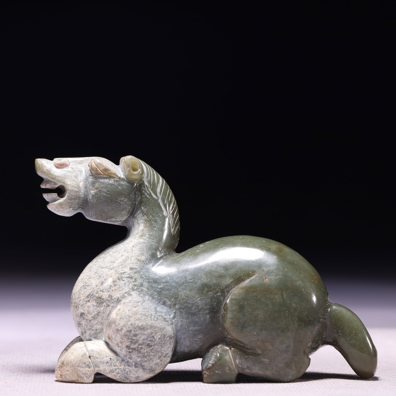 A Rare Green Jade Horse Ornament: A Rare Green Jade Horse Ornament,Qing Dynasty,China,Size:3.5inx1.2inx2.4in,Weight:200g 青玉骏马摆件,中国清代