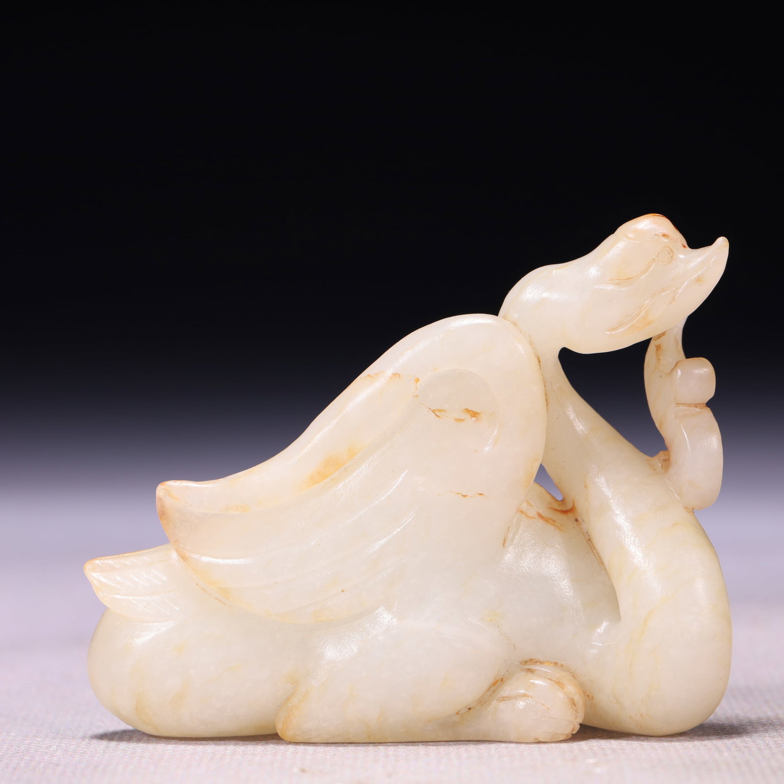 An Exquisite White Jade Goose Ornament: An Exquisite White Jade Goose Ornament,Qing Dynasty,China,Size:2.8inx0.8inx2.2in,Weight:98g 白玉鹅摆件,中国清代