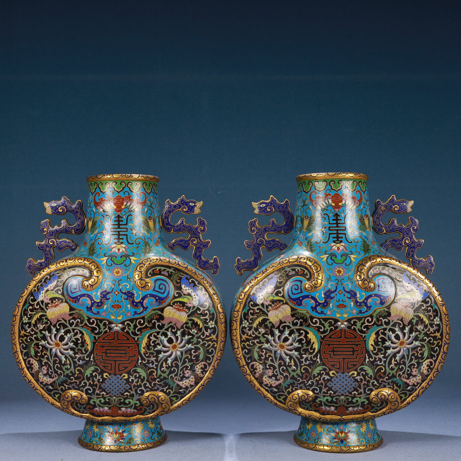 A Pair of Rare Cloisonne Lotus,Bats and Peach Pattern Dragon-Ears Vases: A Pair of Rare Cloisonne Lotus,Bats and Peach Pattern Dragon-Ears Vases,Qing Dynasty, China,Qianlong Four-character Mark,Size:9.4inx4.7inx12.6in,Weight:4950g
