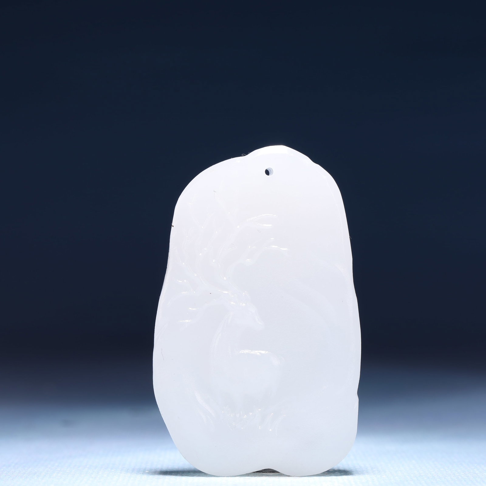 An Exquisite White Jade Deer Pattern Pendant: An Exquisite White Jade Deer Pattern Pendant,Size:1.6inx0.4inx2.4in,Weight:43g 白玉鹿纹牌