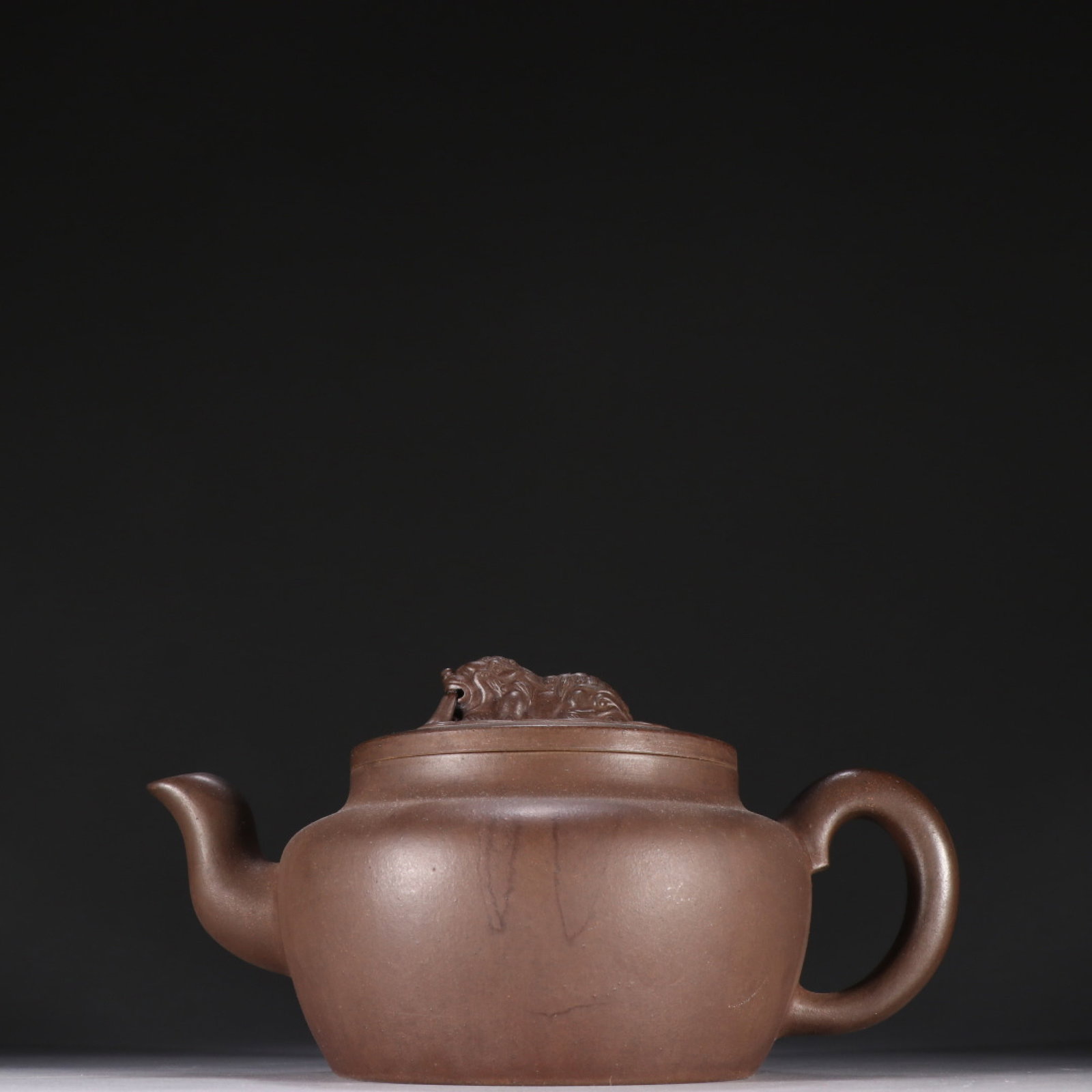 A Rare Purple Sands Lion Pattern Teapot: A Rare Purple Sands Lion Pattern Teapot,Qing Dynasty,China,Shao Xumao Mark,Size:3.9inx7.3in