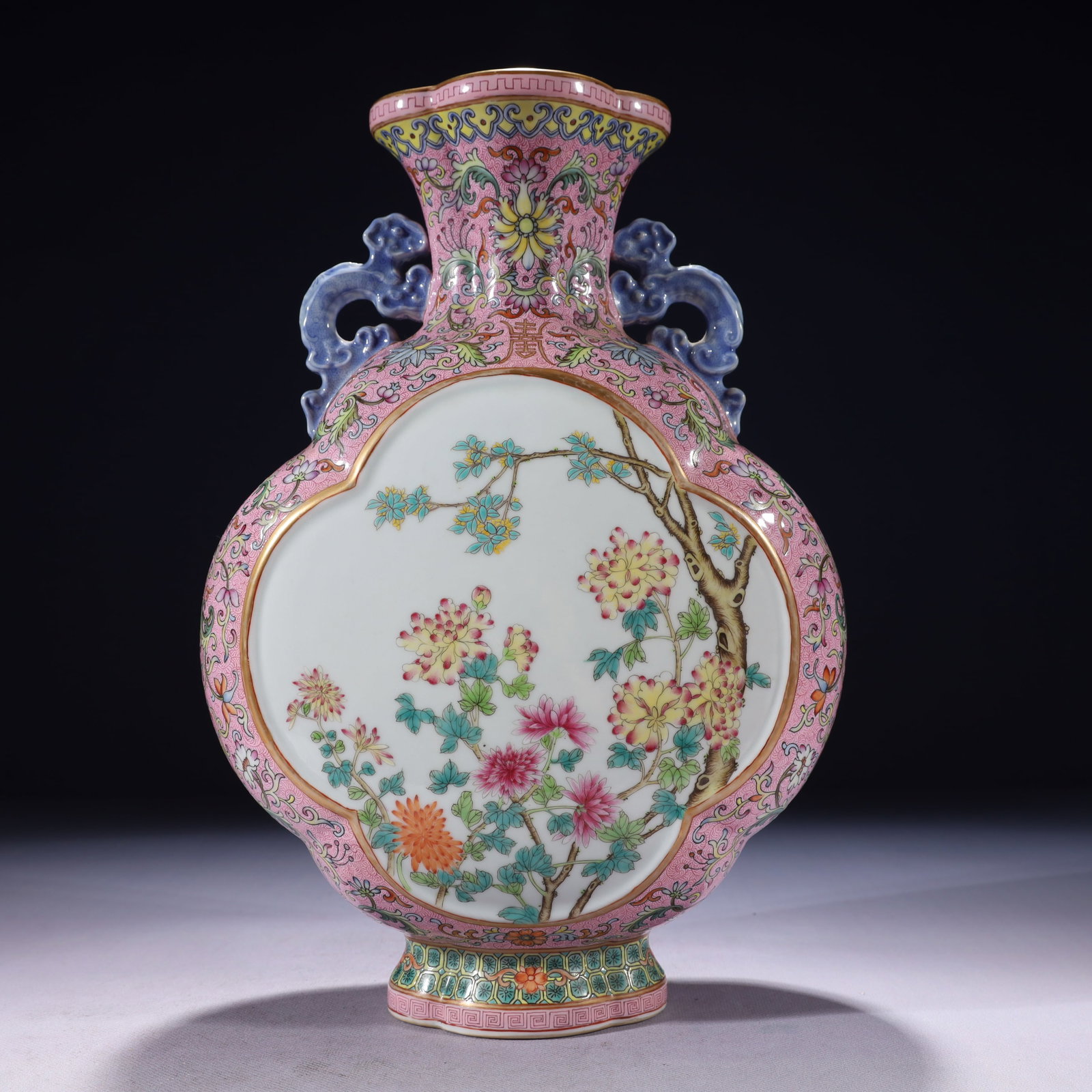 An Exquisite Famille-Rose Painted Gold Flower Pattern Double-Ears Vase: An Exquisite Famille-Rose Painted Gold Flower Pattern Double-Ears Vase,Qing Dynasty,China,Qianlong Six-character Mark,Size:8.7inx4.3inx13in,Weight:2650g 粉彩描金花卉