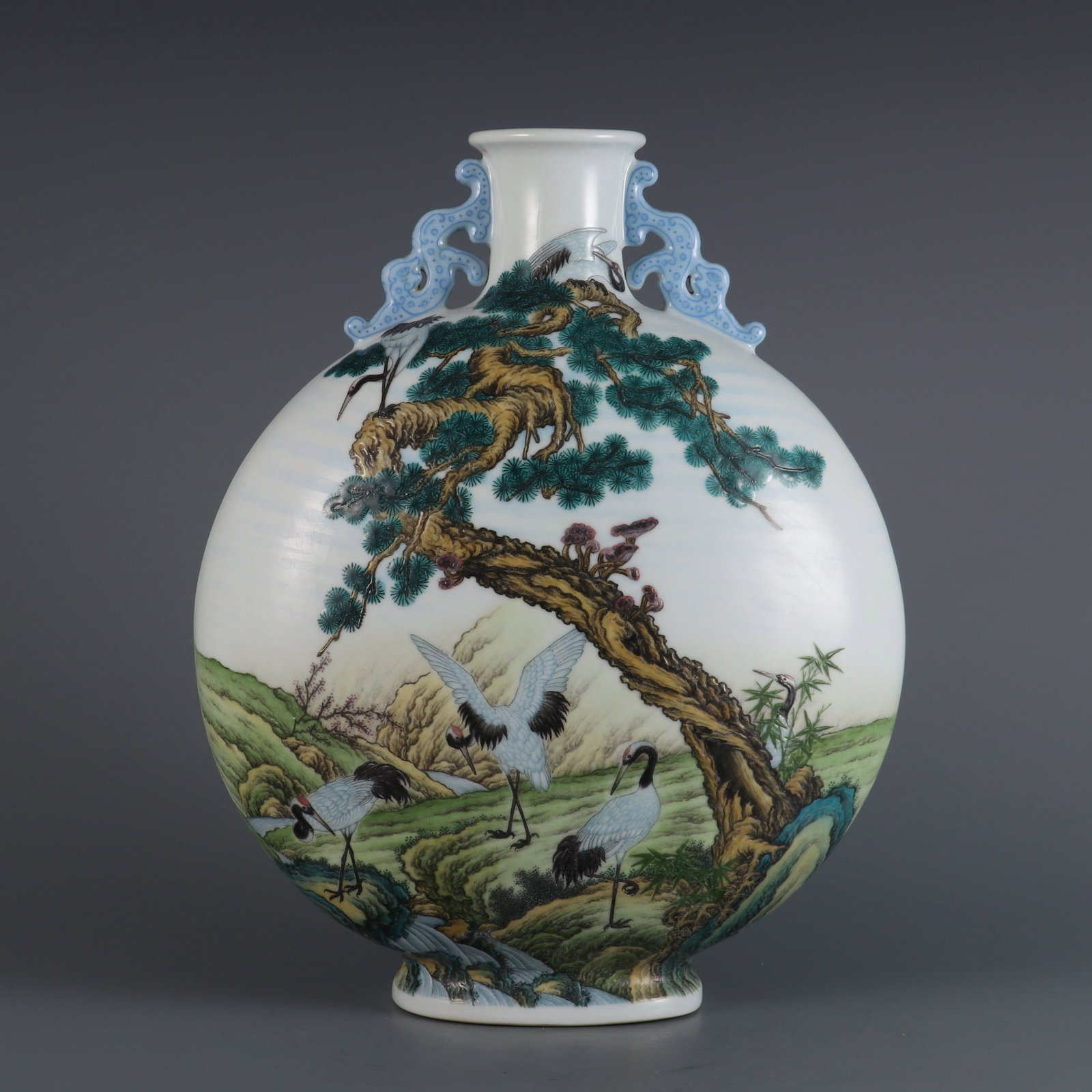 An Exquisite Enamel Pine and Crane Pattern Dragon-Ears Vase: An Exquisite Enamel Pine and Crane Pattern Dragon-Ears Vase,Qing Dynasty, China,Yongzheng Four-character Mark,Size:12.5inx9.4inx2.4in 珐琅彩松鹤纹龙耳&#