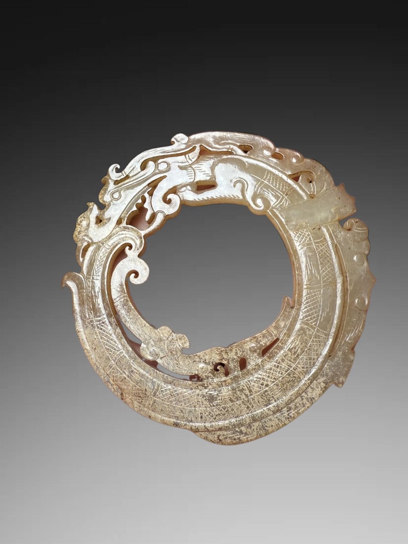 An Exquisite Hotan Jade Dragon-Shaped Bi (1 of 3)